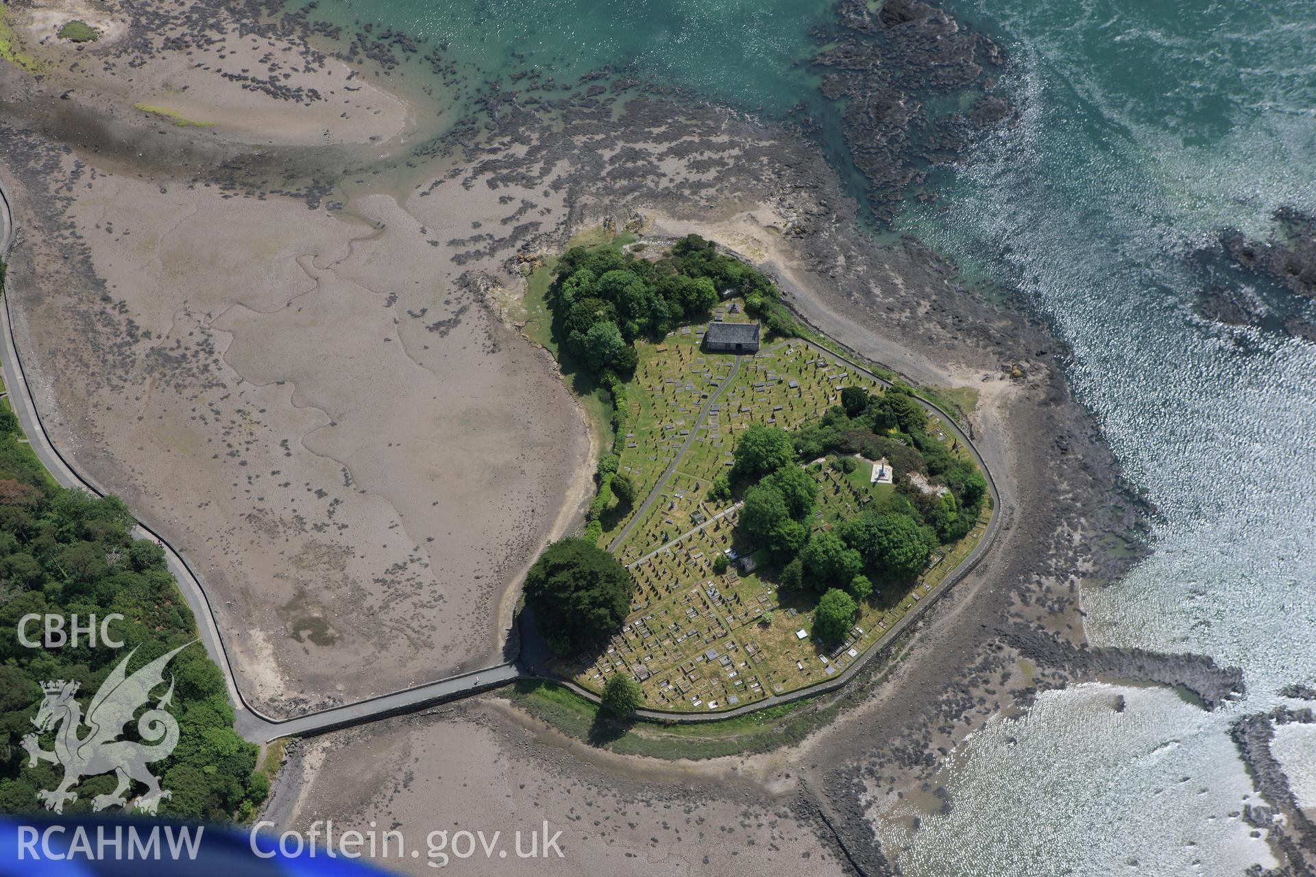 RCAHMW colour oblique aerial photograph of St Tysilio's Church. Taken on 16 June 2009 by Toby Driver