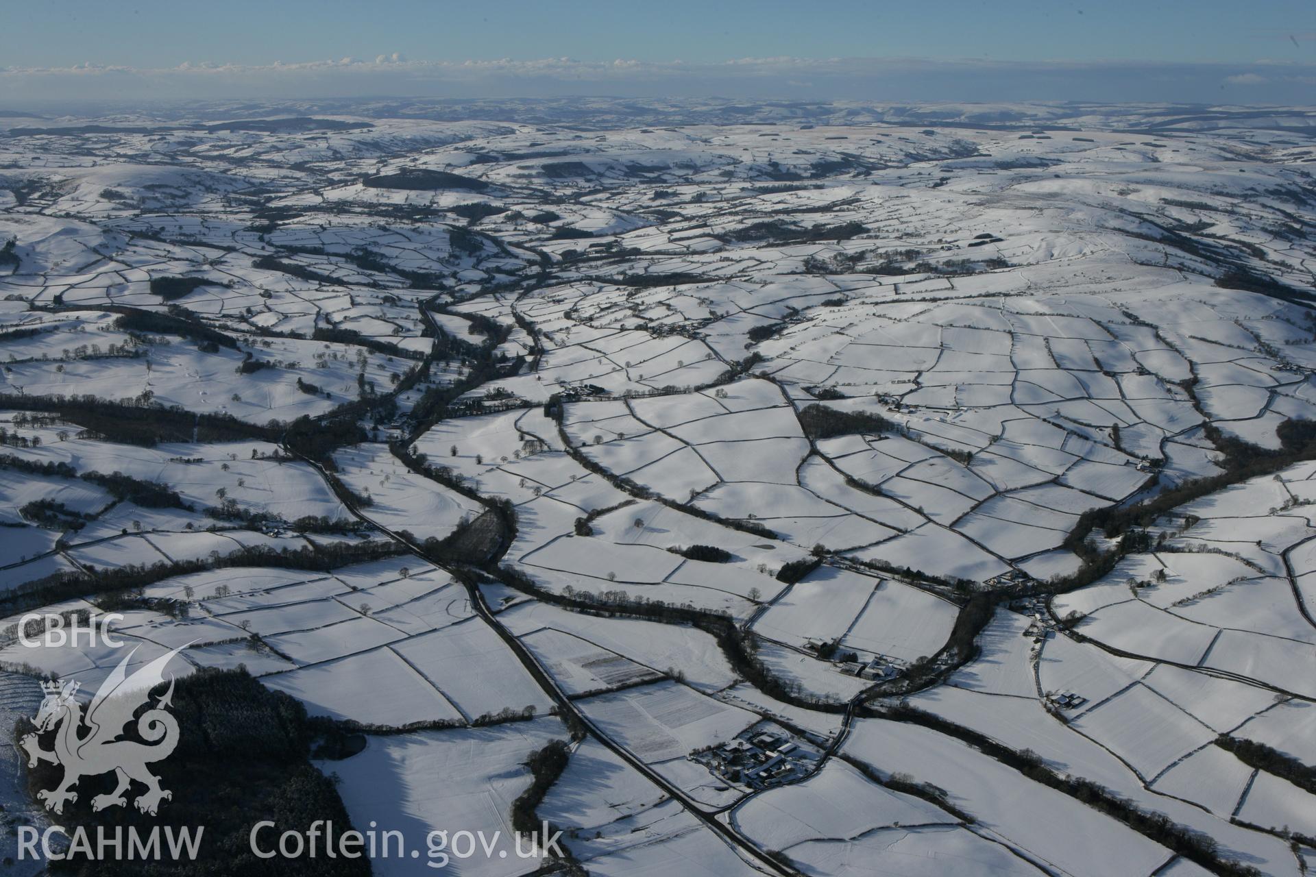 RCAHMW colour oblique photograph of Landscape west of Aberbran-fawr house. Taken by Toby Driver on 06/02/2009.
