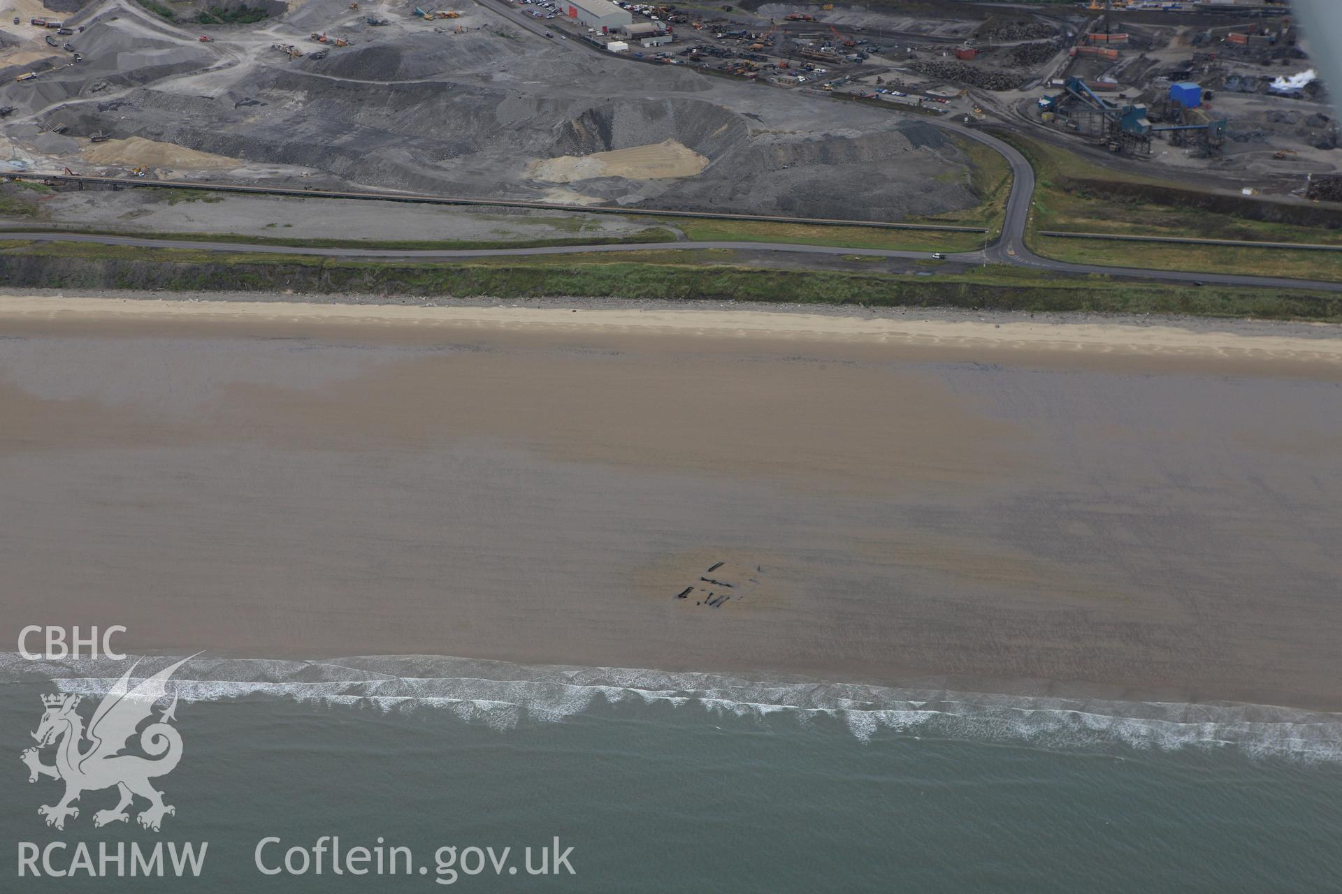 RCAHMW colour oblique aerial photograph of Margam Sands Wreck. Taken on 09 July 2009 by Toby Driver