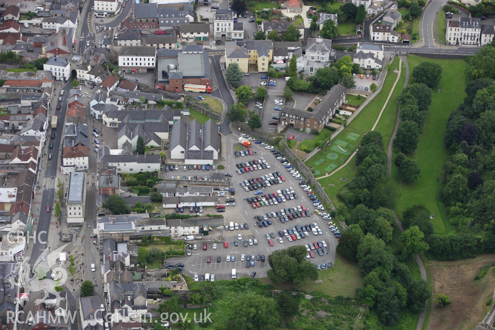 RCAHMW colour oblique aerial photograph of Chepstow Town Wall and Gate. Taken on 09 July 2009 by Toby Driver