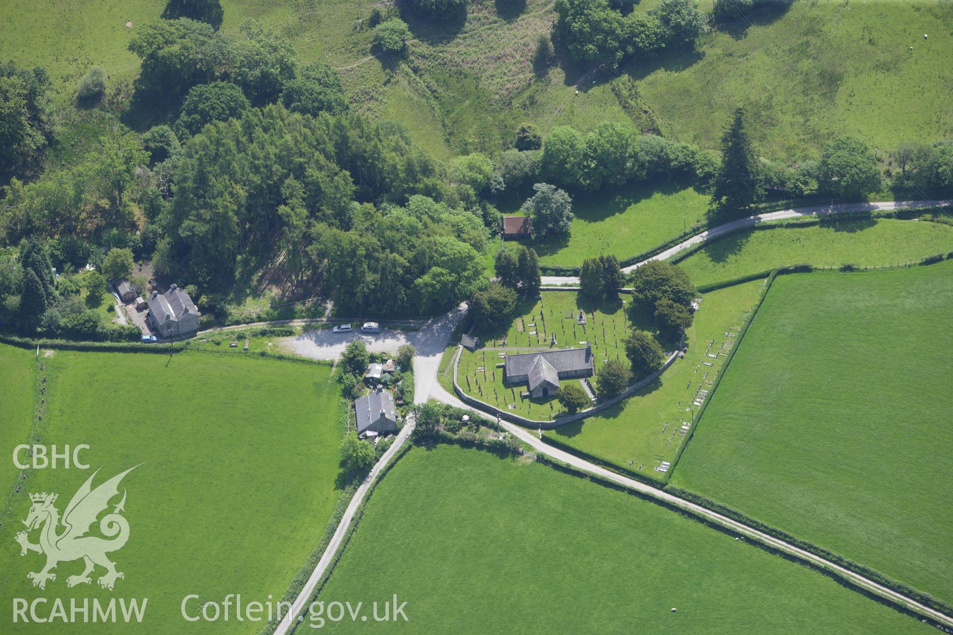 RCAHMW colour oblique aerial photograph of St Michaels Church, Llanfihangel-y-Pennant. Taken on 02 June 2009 by Toby Driver