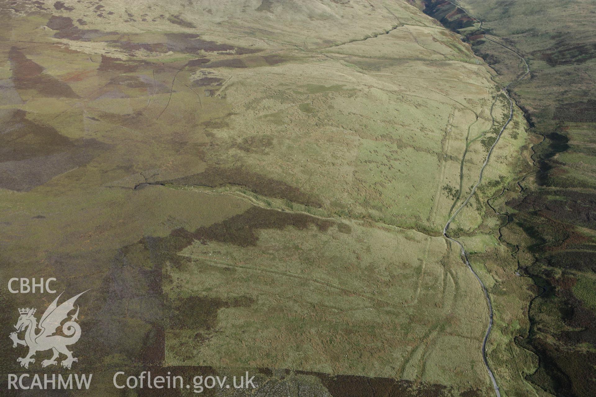 RCAHMW colour oblique aerial photograph of Pen Plaenau Roman Marching Camp. Taken on 13 October 2009 by Toby Driver