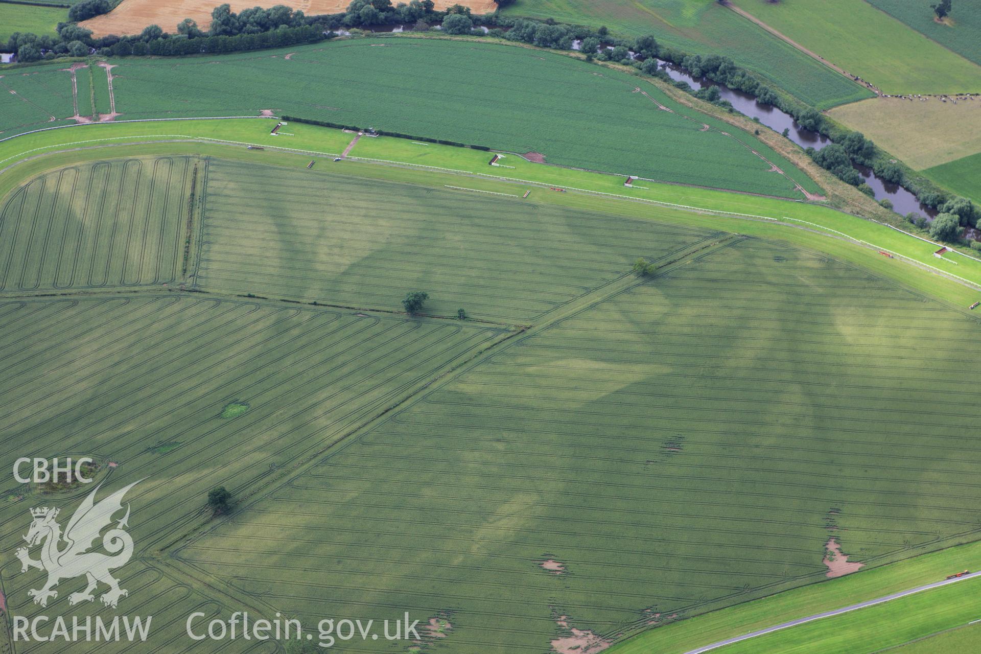RCAHMW colour oblique aerial photograph of Bangor Race Course Enclosure. Taken on 08 July 2009 by Toby Driver