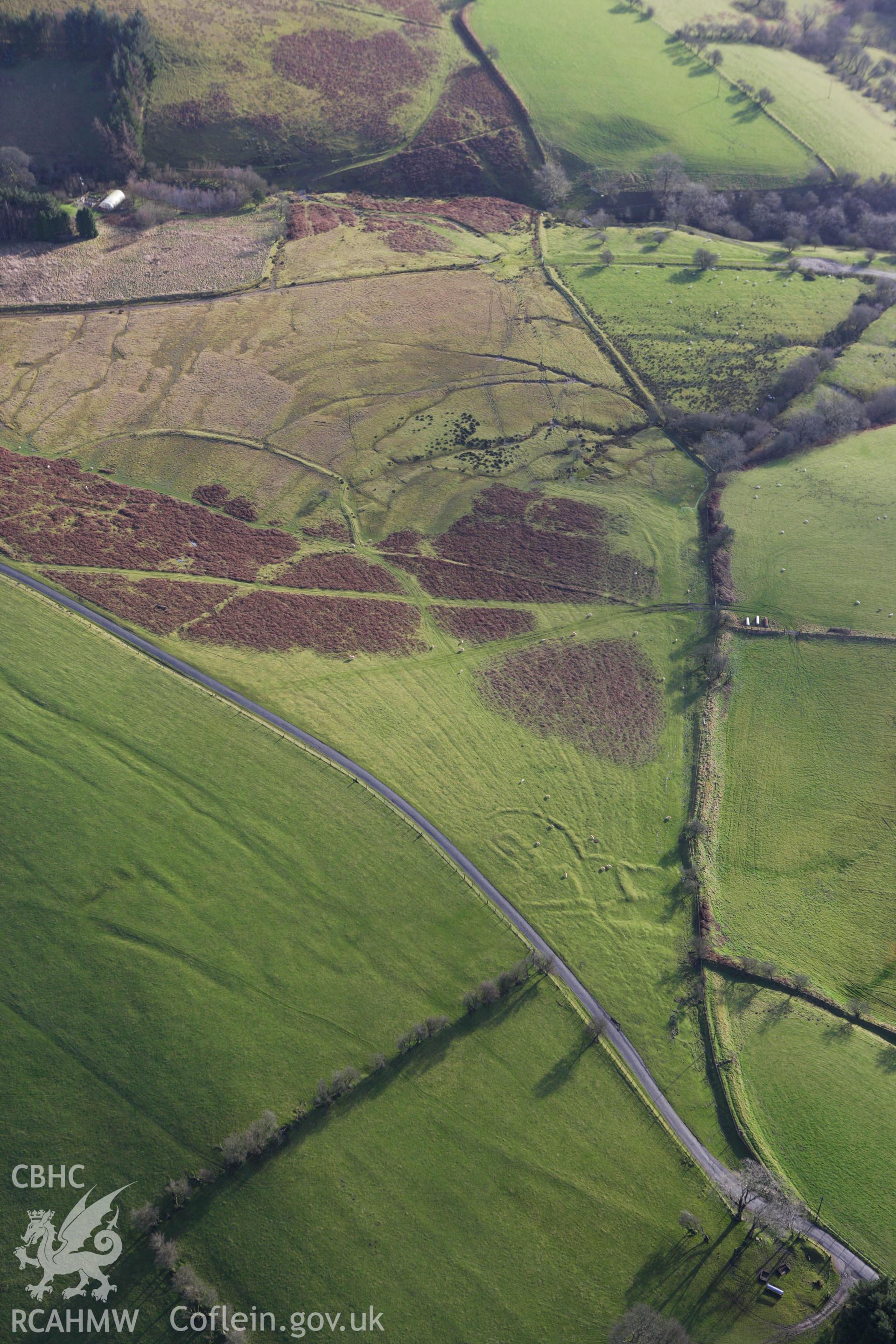 RCAHMW colour oblique aerial photograph of the western part of Fron Top Deserted Rural Settlement. Taken on 10 December 2009 by Toby Driver