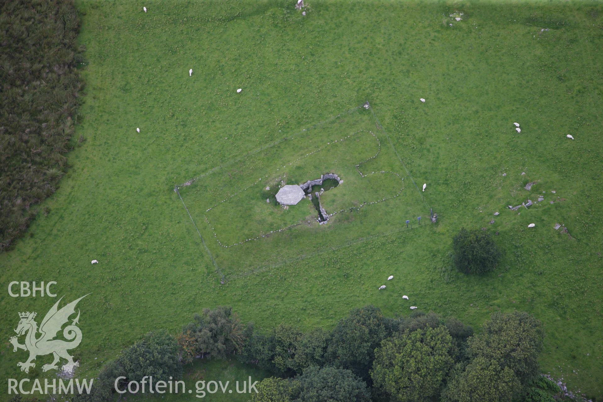 RCAHMW colour oblique aerial photograph of Capel Garmon Burial Chamber. Taken on 06 August 2009 by Toby Driver