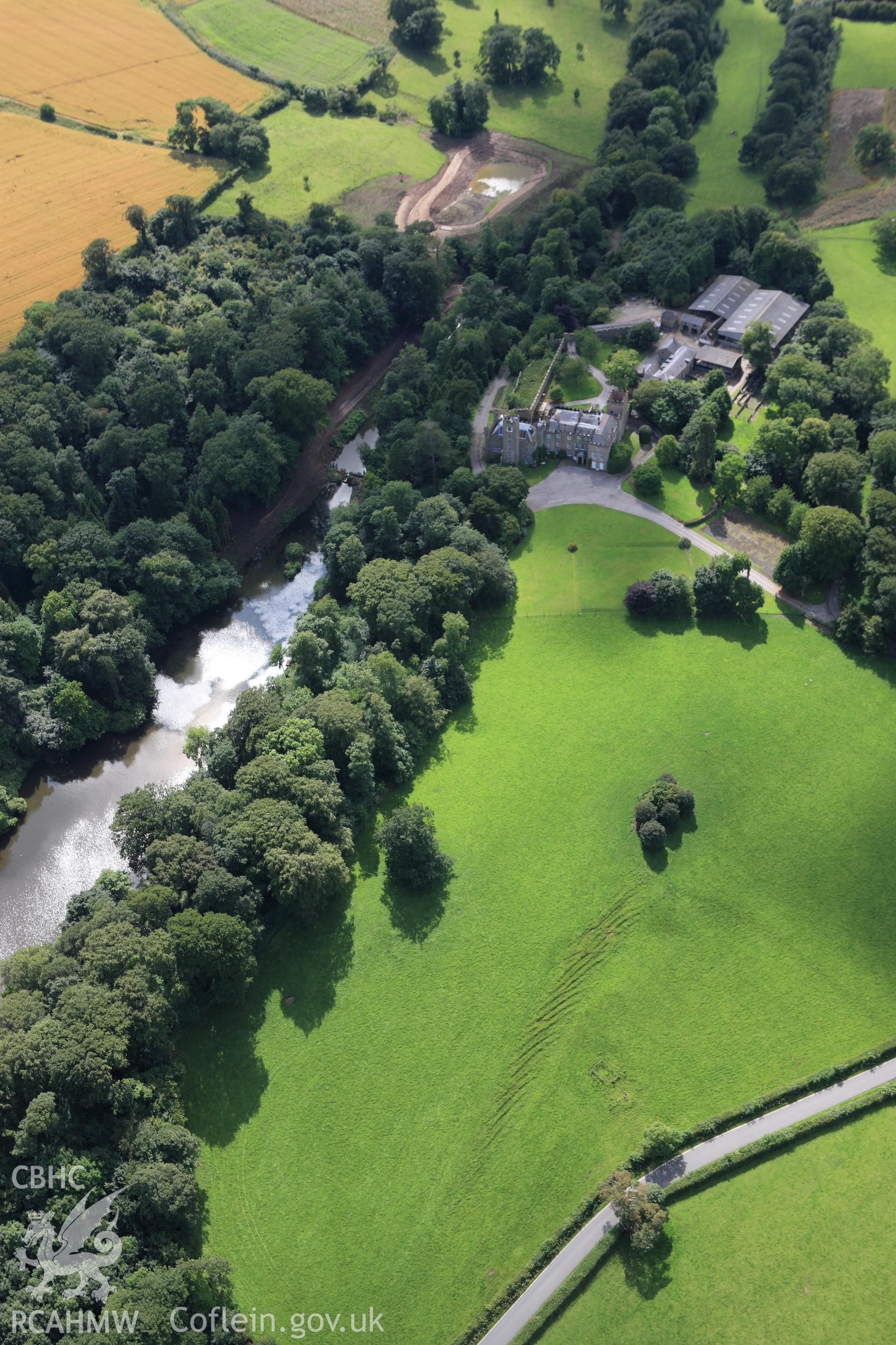 RCAHMW colour oblique aerial photograph of Gyrn Castle Grounds and Gardens. Taken on 30 July 2009 by Toby Driver