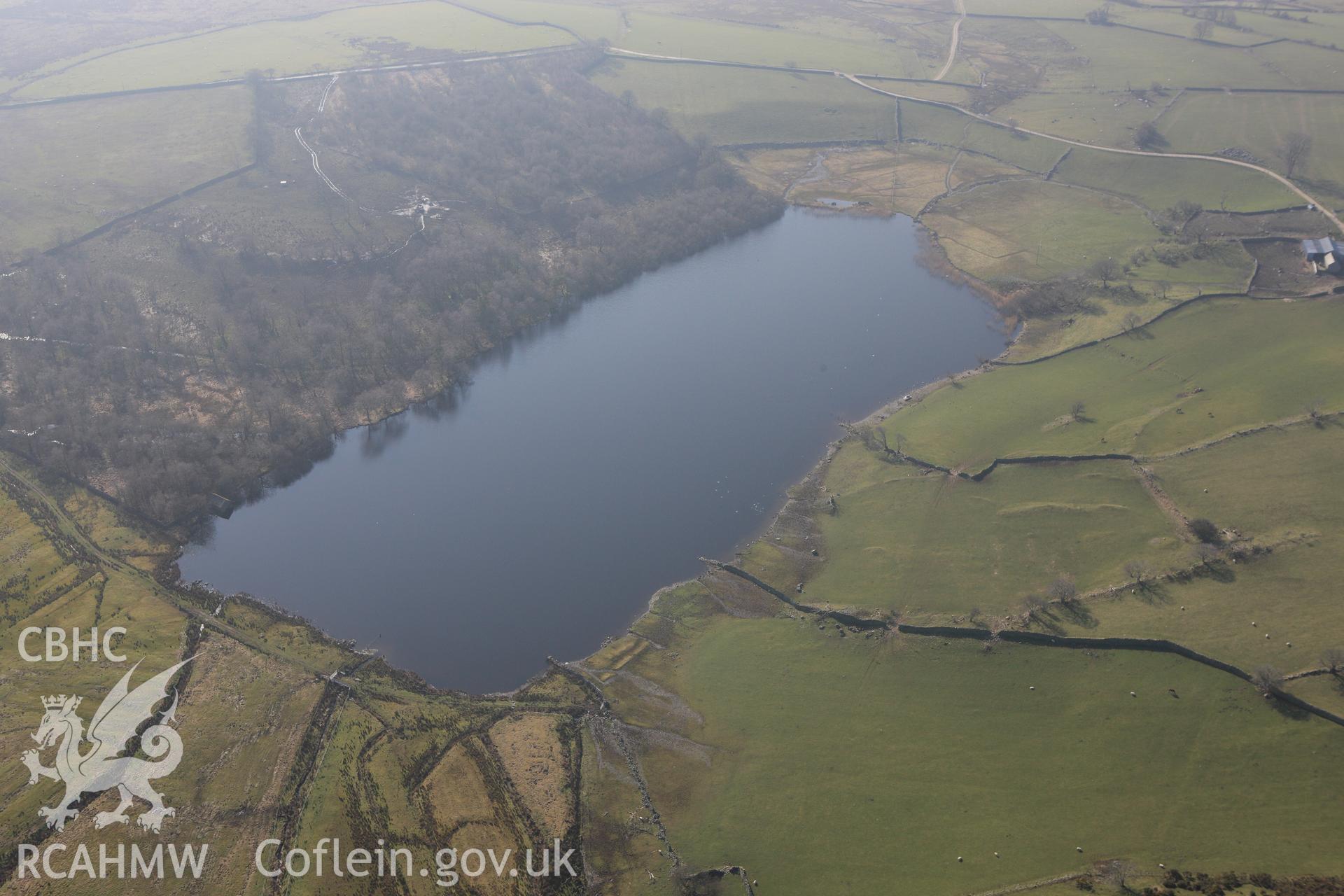 RCAHMW colour oblique photograph of Llyn y Cwrt lake,. Taken by Toby Driver on 18/03/2009.