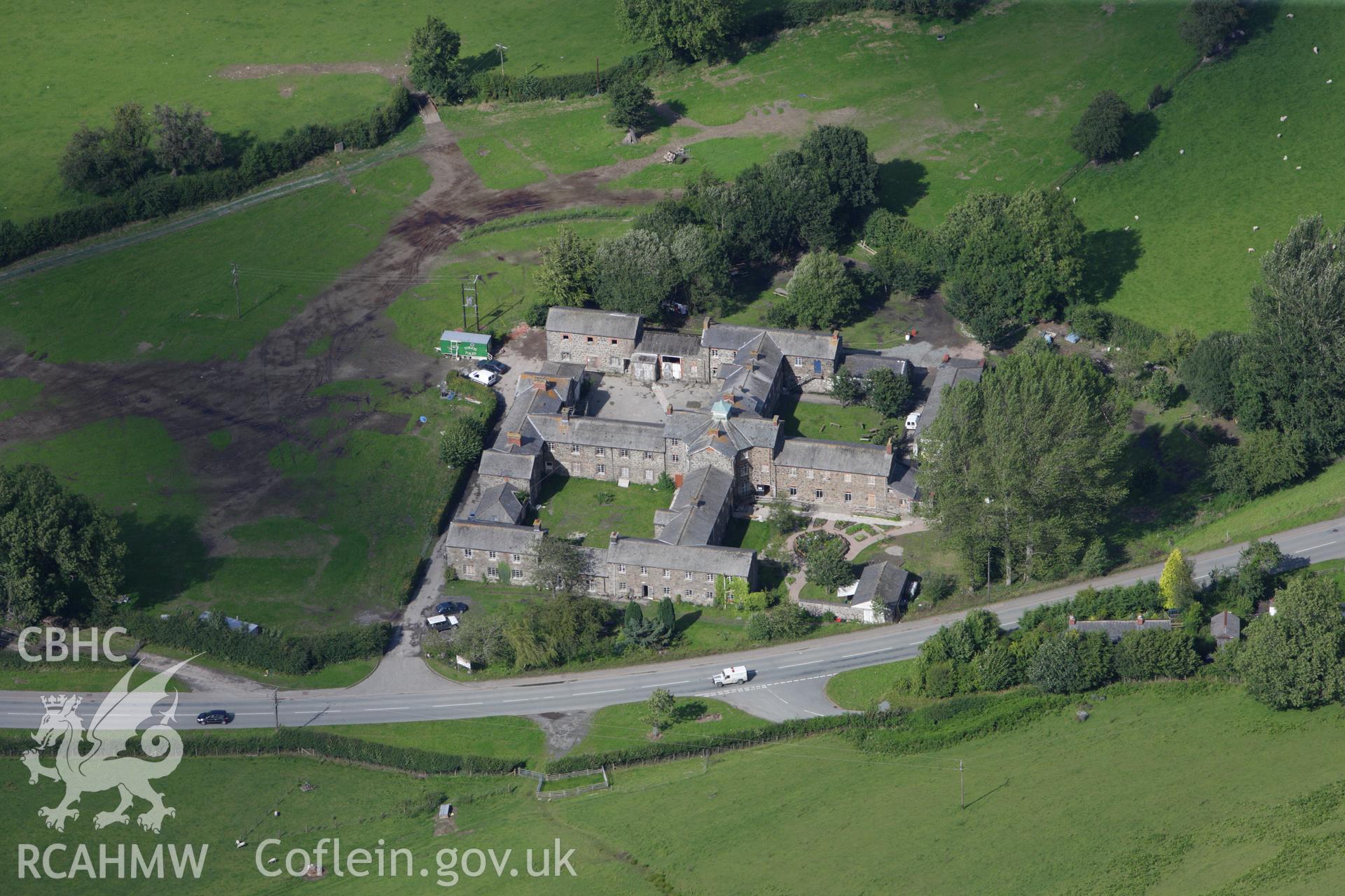 RCAHMW colour oblique aerial photograph of Llanfyllin Union Workhouse, Y Dolydd, Llanfyllin. Taken on 30 July 2009 by Toby Driver