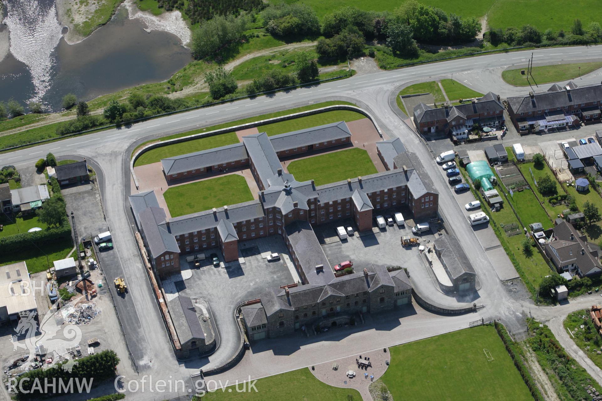 RCAHMW colour oblique aerial photograph of the Union Workhouse, Caersws. Taken on 02 June 2009 by Toby Driver
