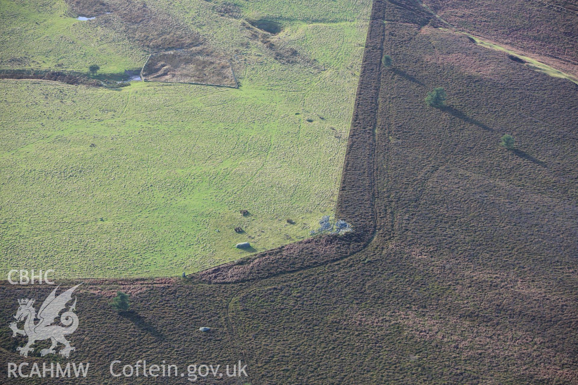 RCAHMW colour oblique aerial photograph of Eglwyseg Cairn Circle. Taken on 10 December 2009 by Toby Driver