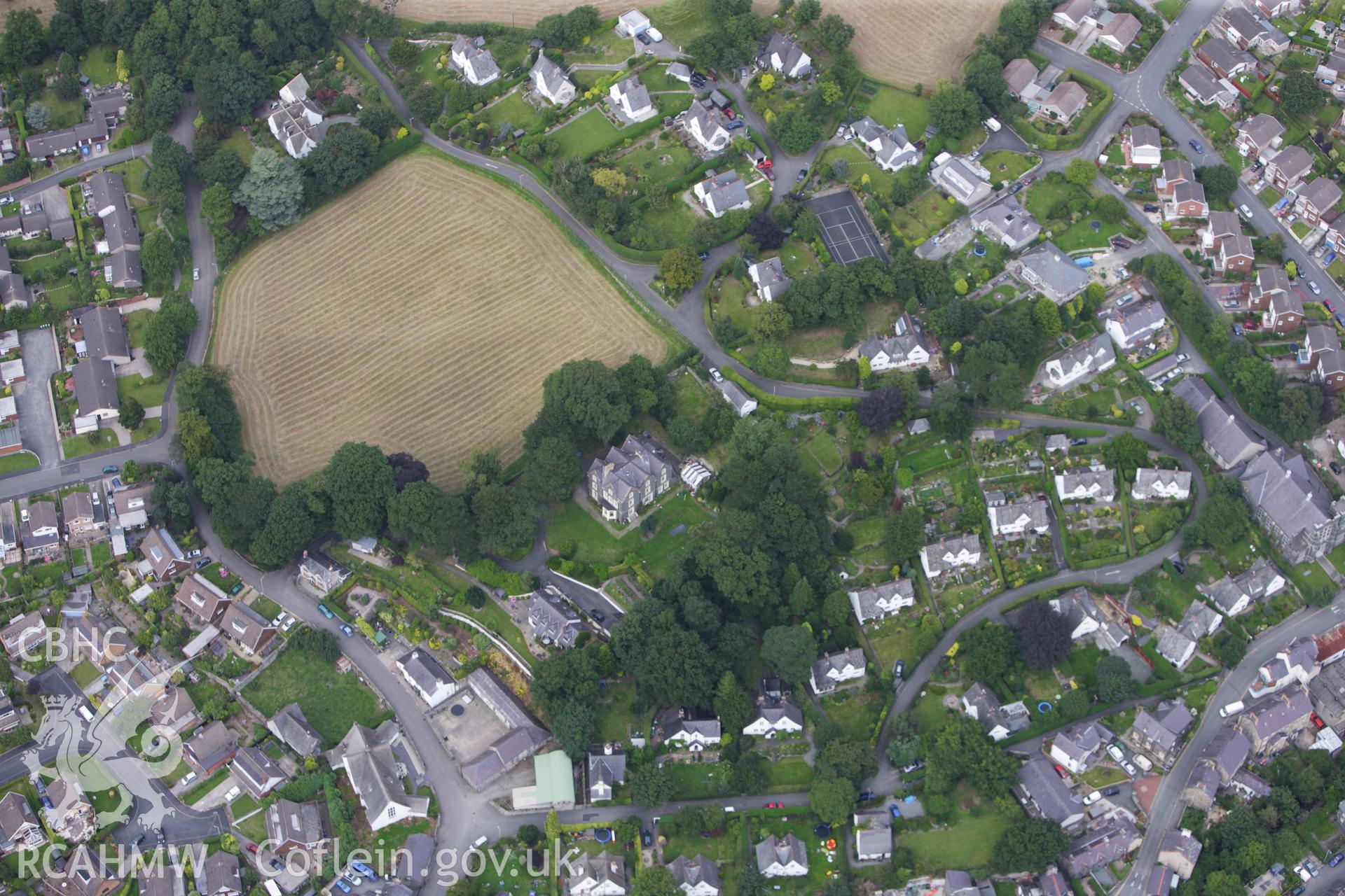 RCAHMW colour oblique aerial photograph of Church Institute, Park Road, Llanfairfechan. Taken on 06 August 2009 by Toby Driver