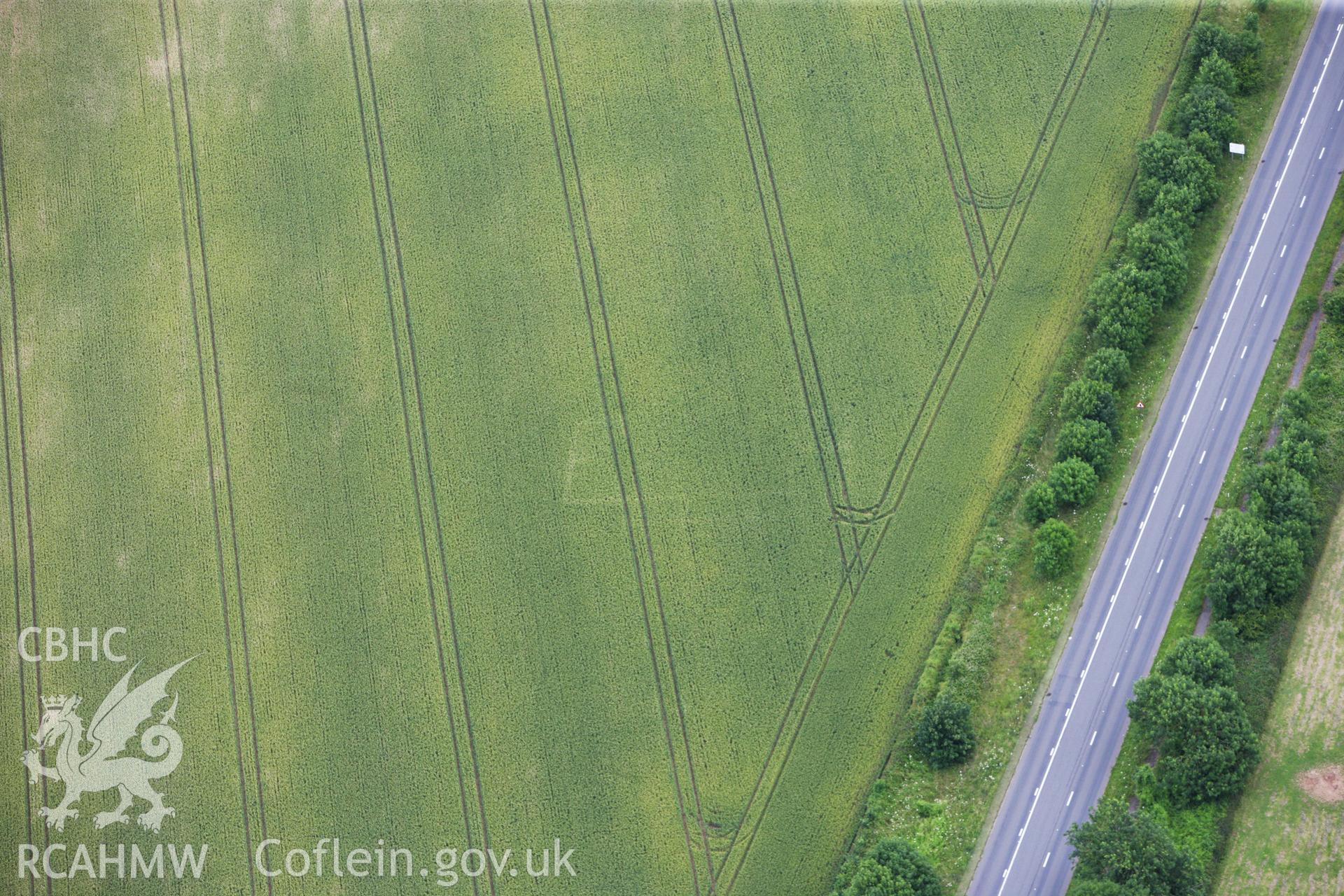 RCAHMW colour oblique aerial photograph of Five Lanes Roman Villa. Taken on 09 July 2009 by Toby Driver