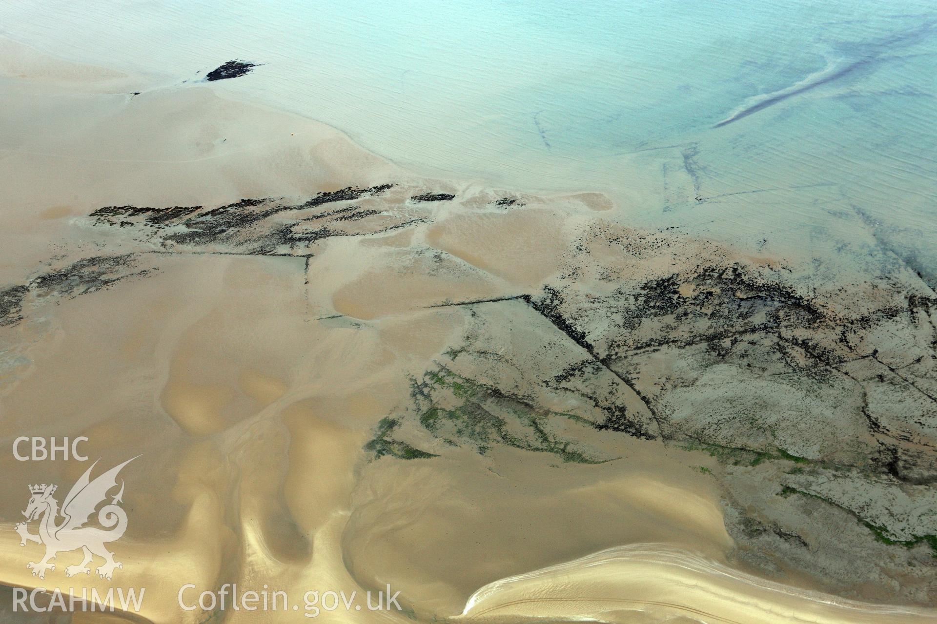 RCAHMW colour oblique aerial photograph of Swansea Bay Fish Traps. Taken on 09 July 2009 by Toby Driver