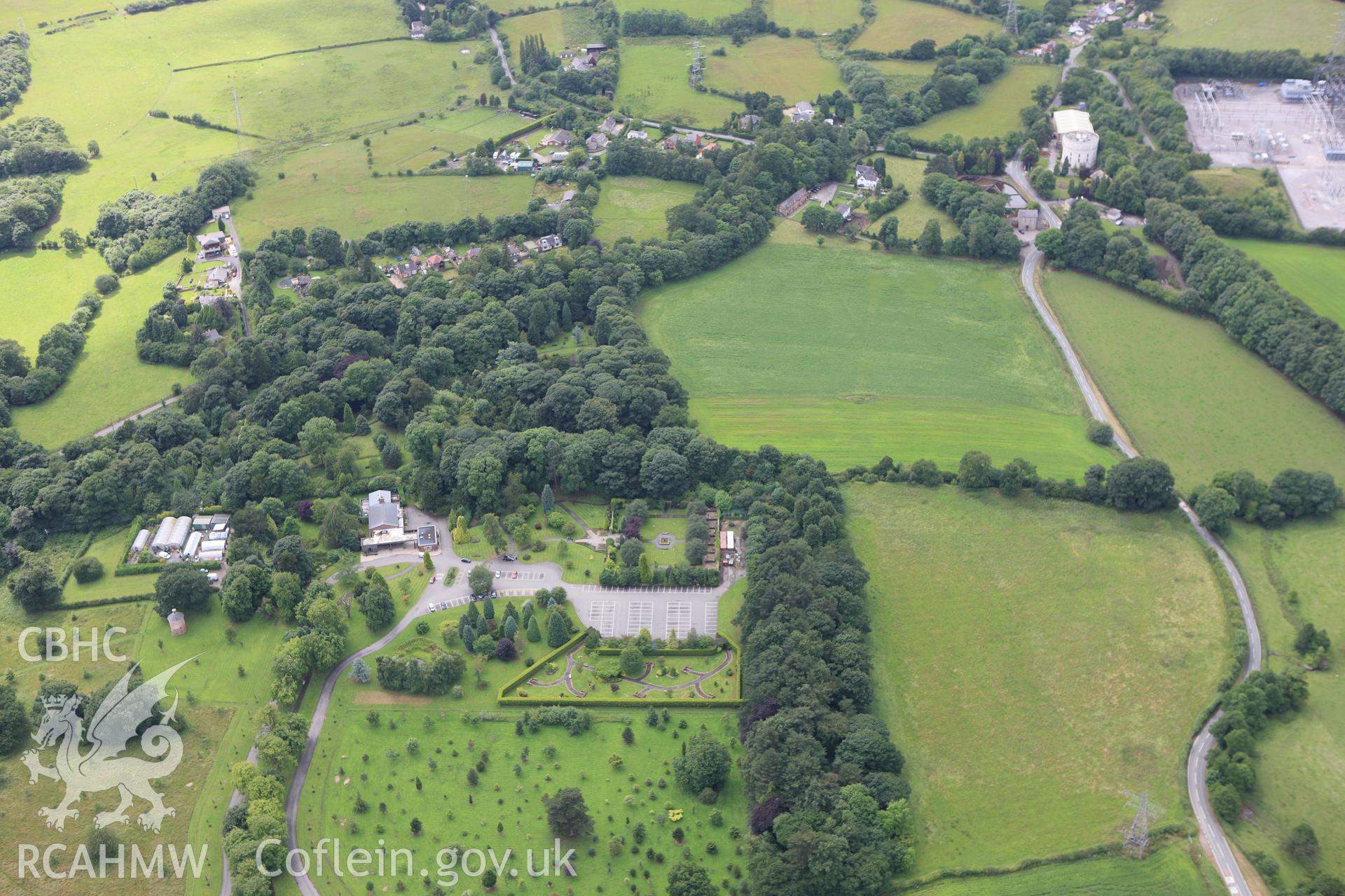 RCAHMW colour oblique aerial photograph of a section of Offa's Dyke at Cadwgwn Hall. Taken on 08 July 2009 by Toby Driver