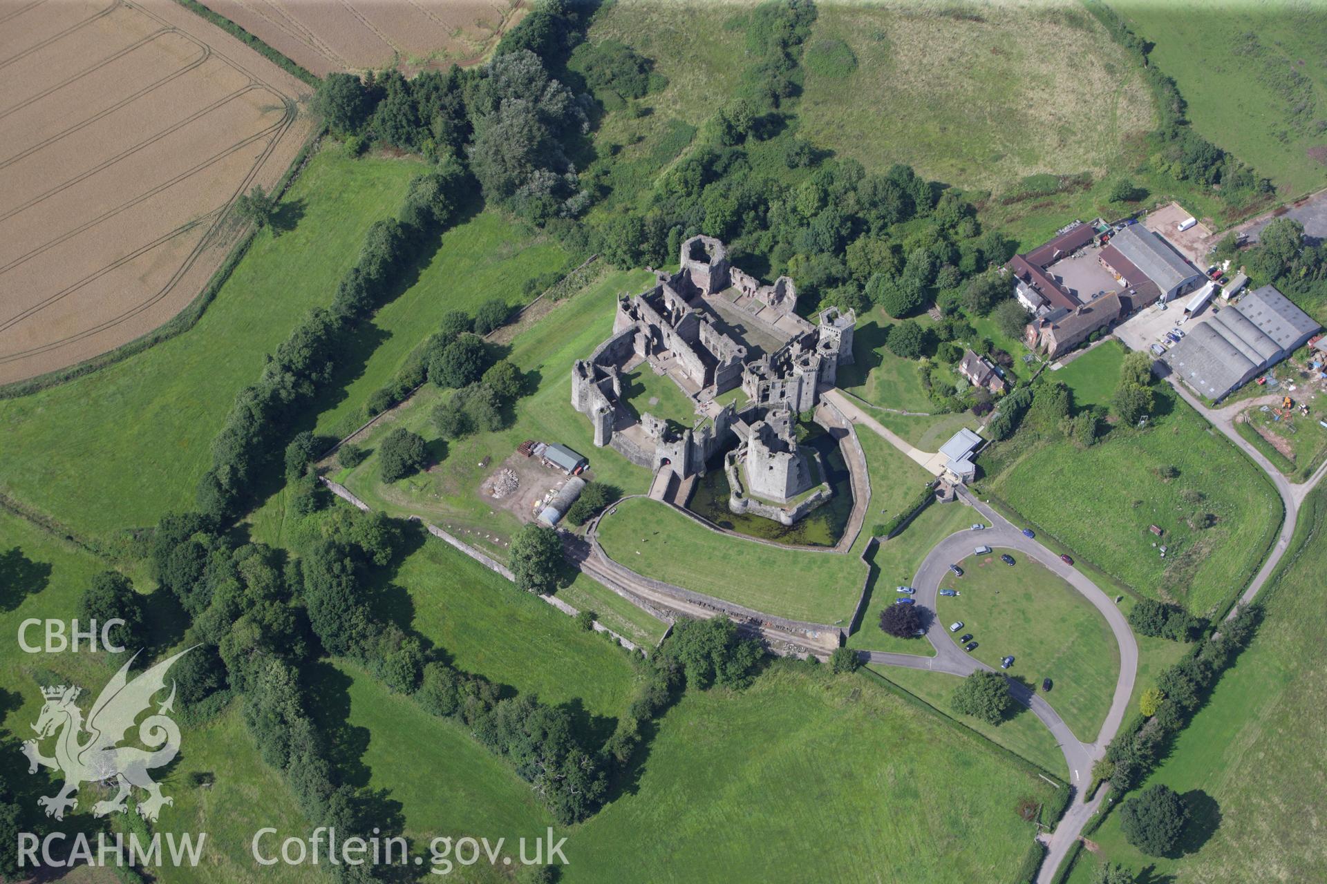 RCAHMW colour oblique aerial photograph of Raglan Castle. Taken on 23 July 2009 by Toby Driver