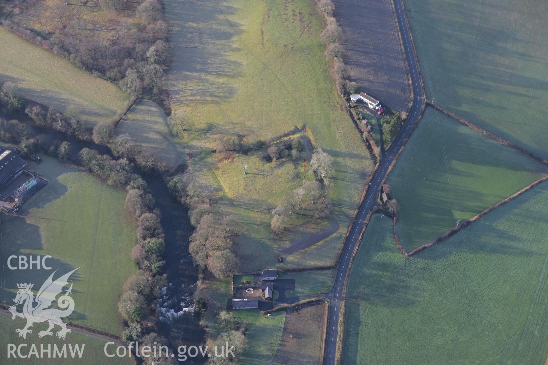 RCAHMW colour oblique photograph of Mathrafal defended enclosure. Taken by Toby Driver on 21/01/2009.