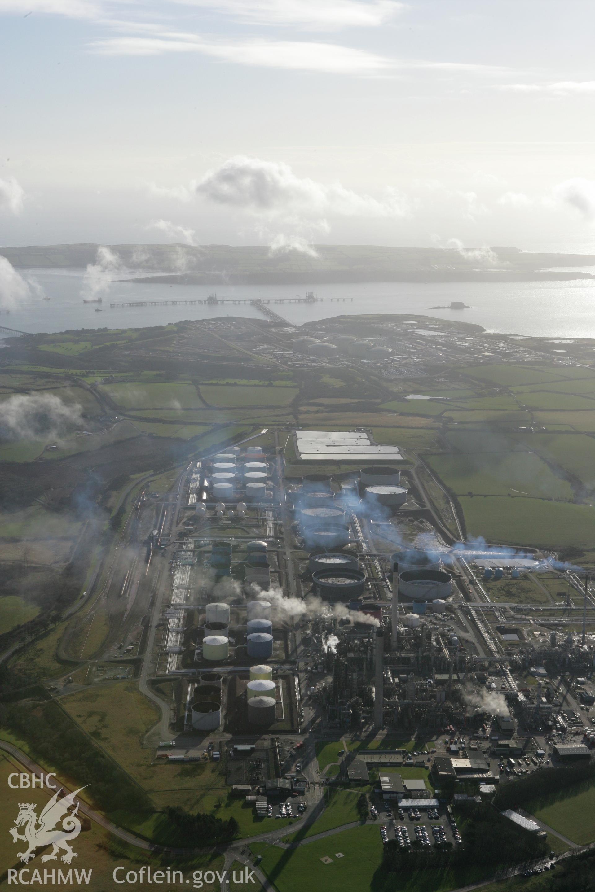 RCAHMW colour oblique photograph of Amoco Oil Refinery, Milford Haven. Taken by Toby Driver on 11/02/2009.