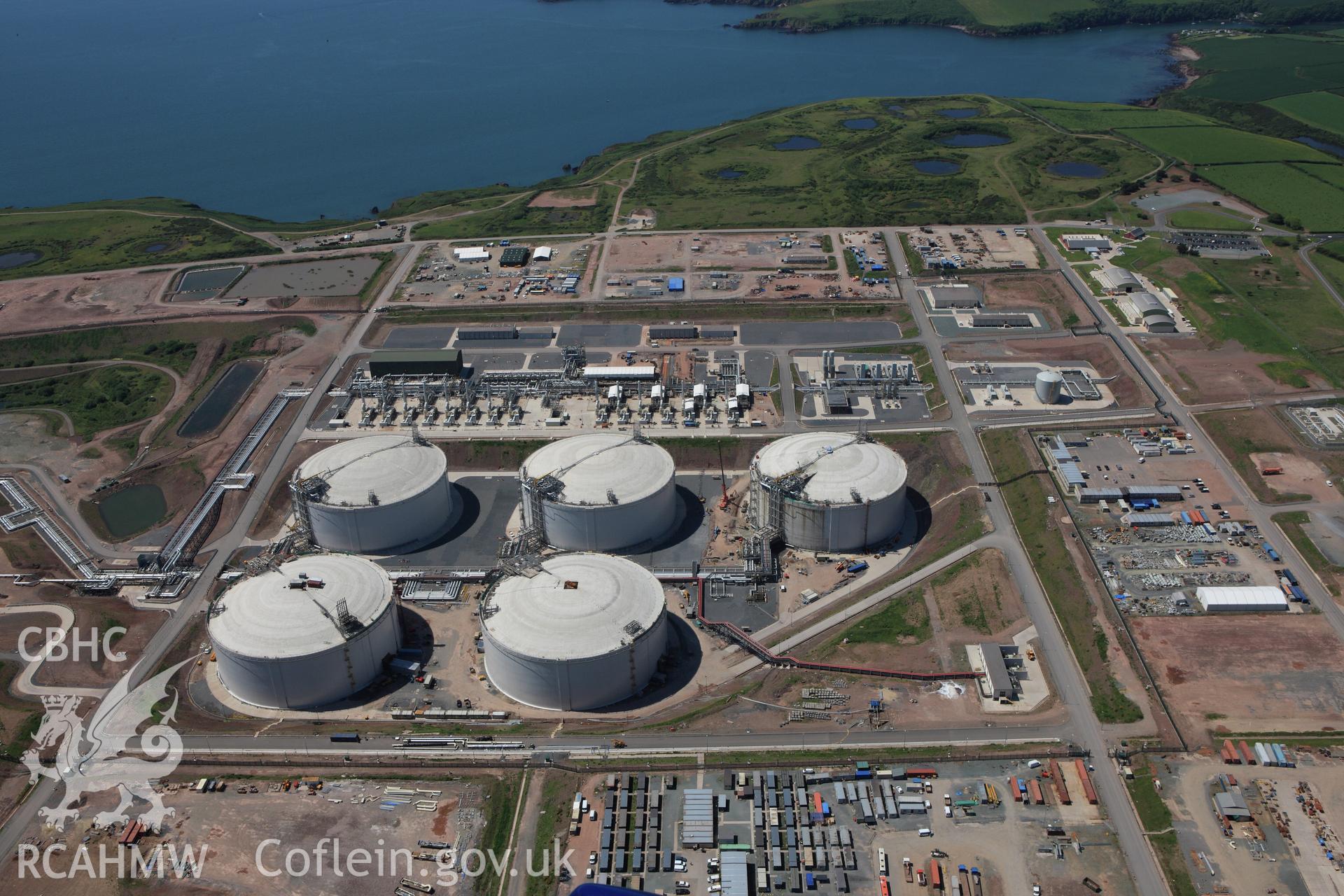 RCAHMW colour oblique aerial photograph of Esso South Hook Oil Refinery and liquid natural gas facility, Milford Haven. Taken on 01 June 2009 by Toby Driver