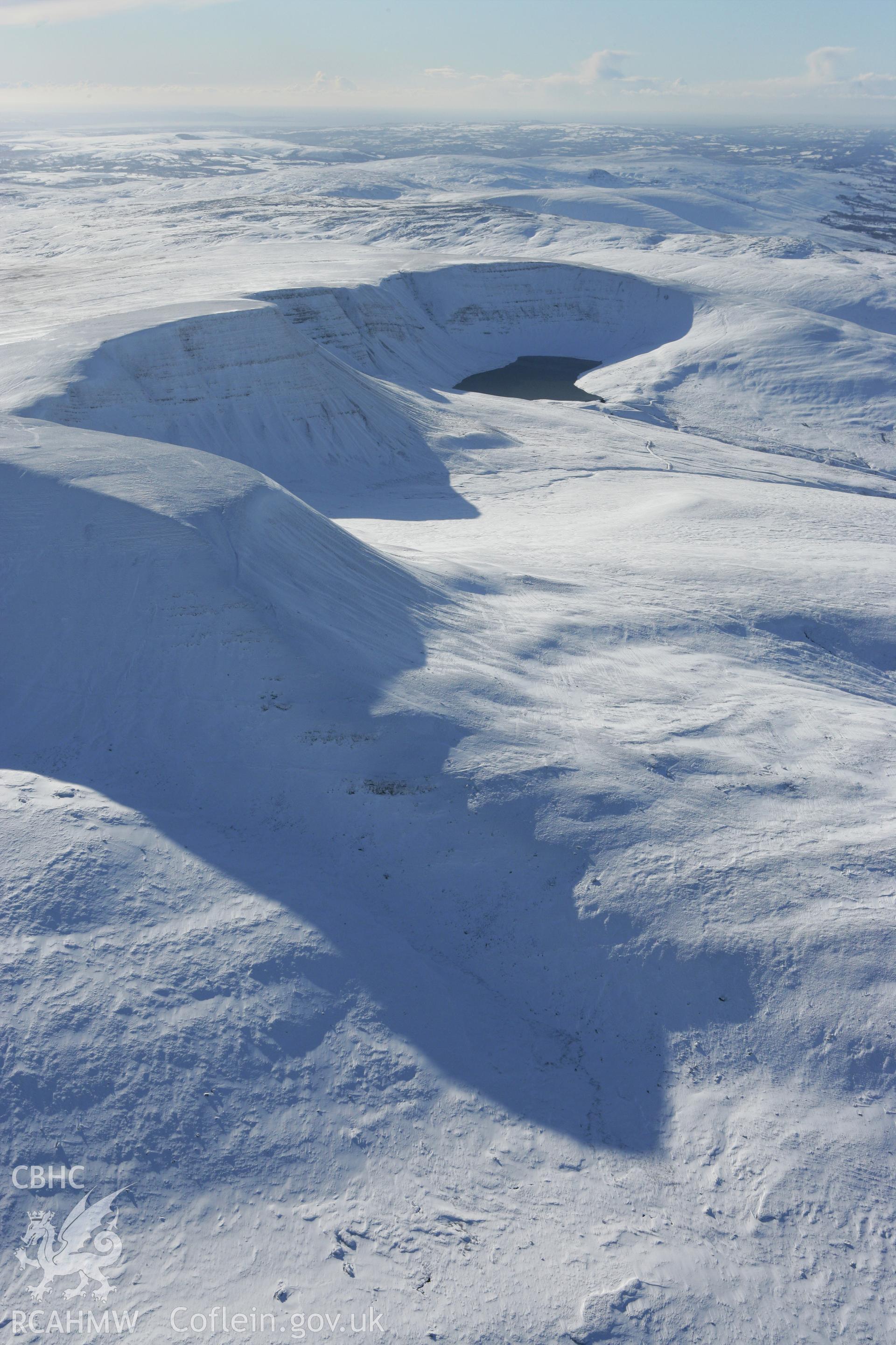 RCAHMW colour oblique photograph of Llyn y Fan Fach, winter landscape. Taken by Toby Driver on 06/02/2009.