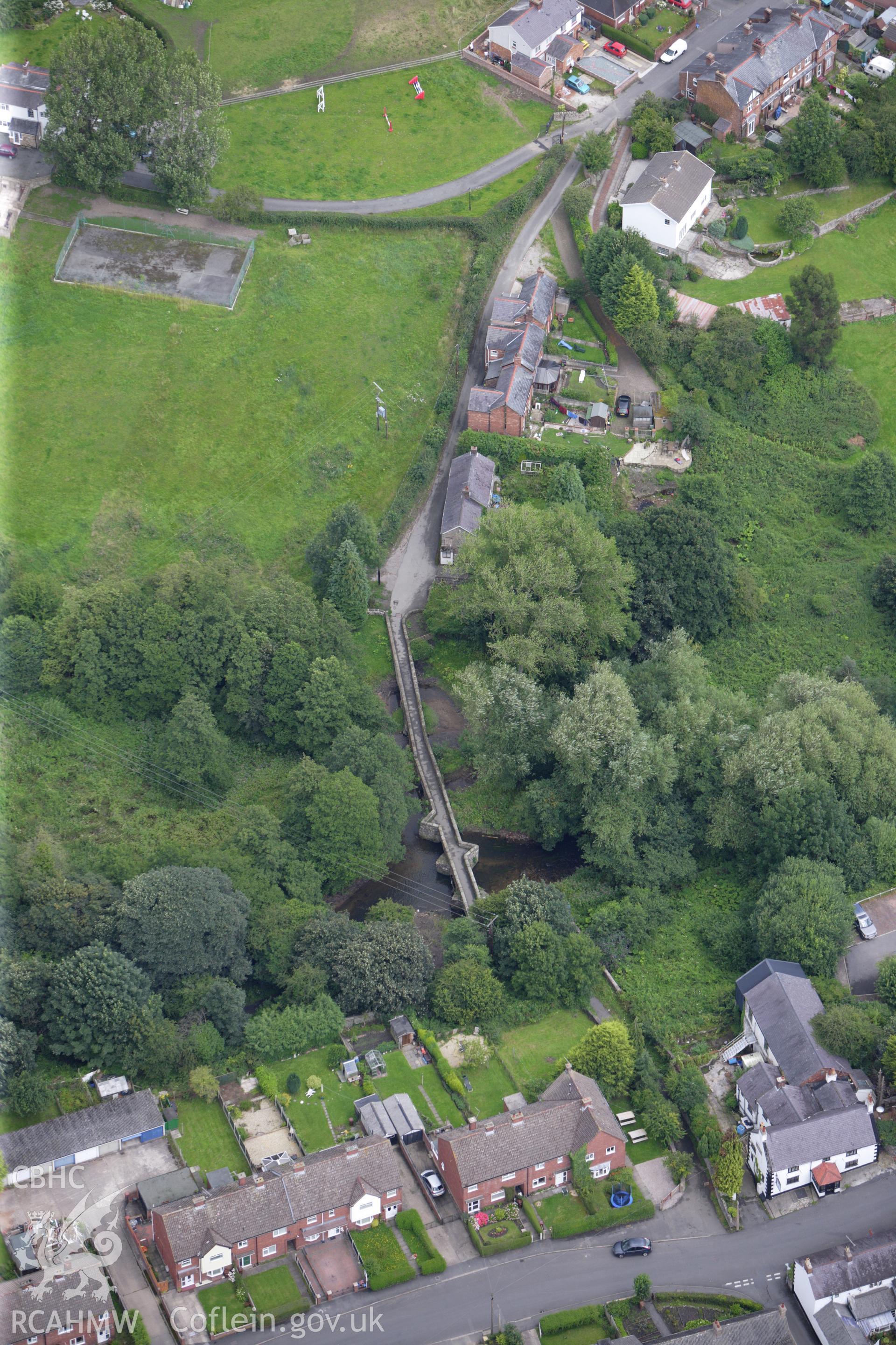 RCAHMW colour oblique aerial photograph of Caergwrle Bridge. Taken on 30 July 2009 by Toby Driver