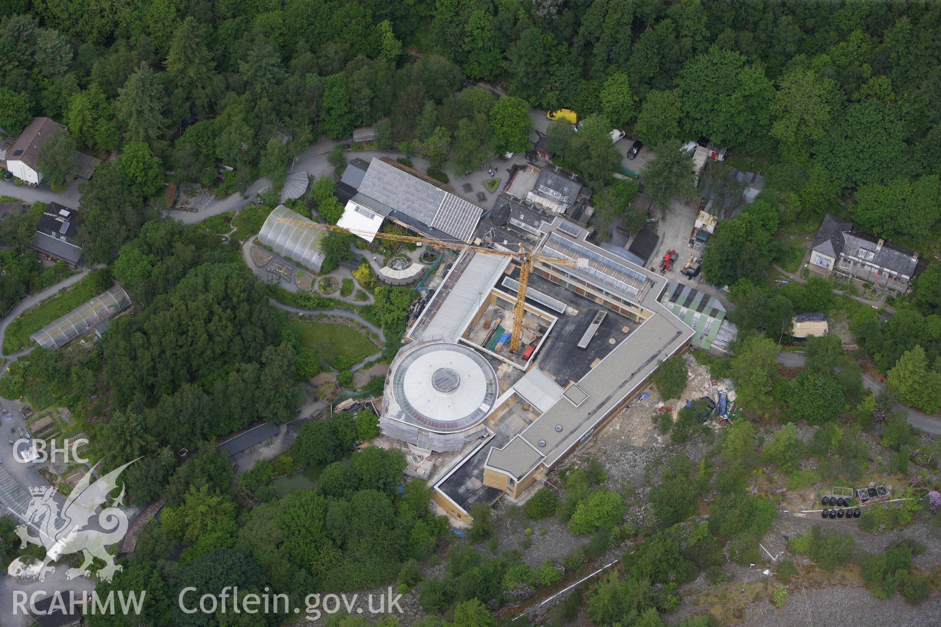 RCAHMW colour oblique aerial photograph of Centre For Alternative Technology, Llwyngwern Quarry, Machynlleth. Taken on 02 June 2009 by Toby Driver