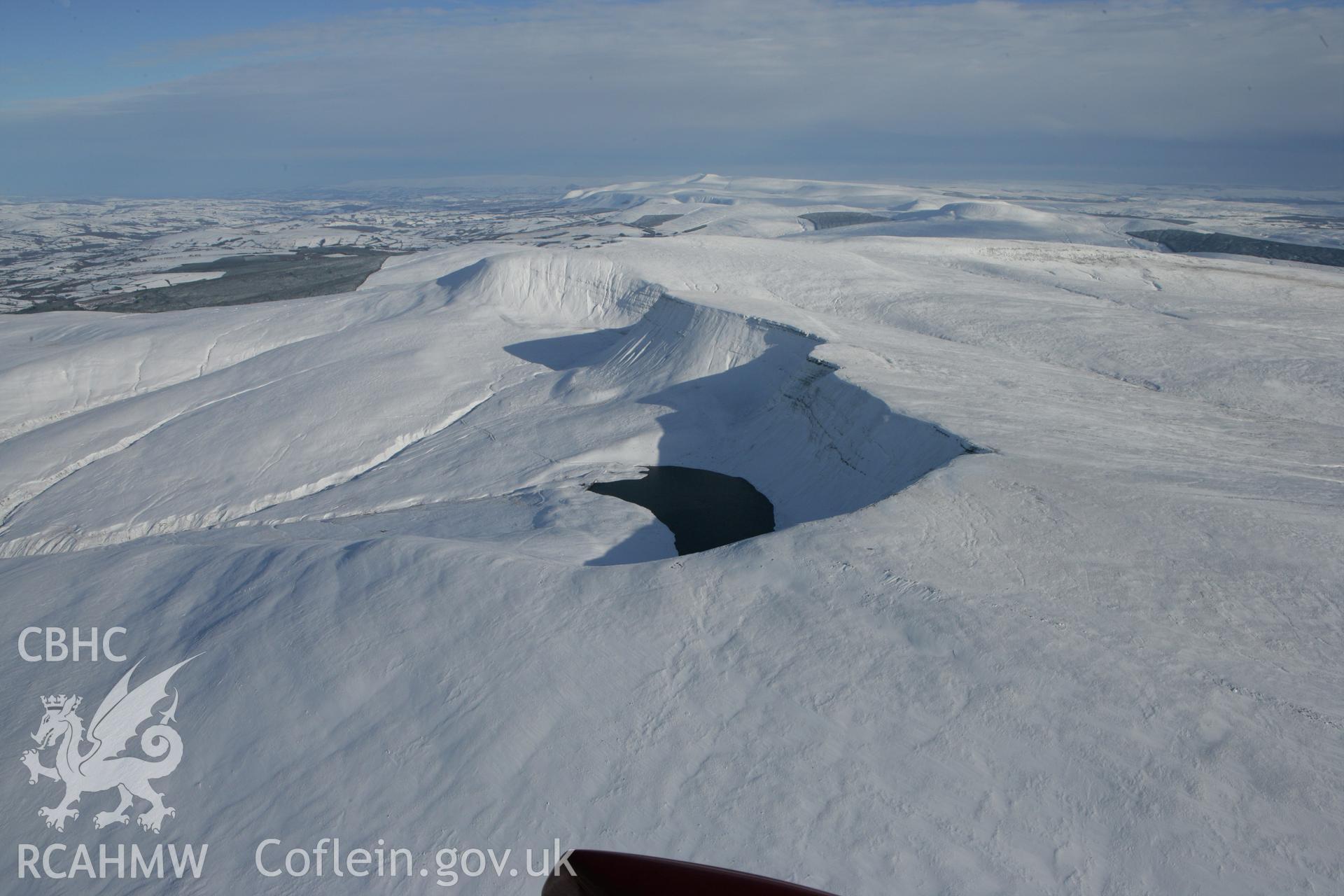 RCAHMW colour oblique photograph of Llyn y Fan Fach, winter landscape. Taken by Toby Driver on 06/02/2009.