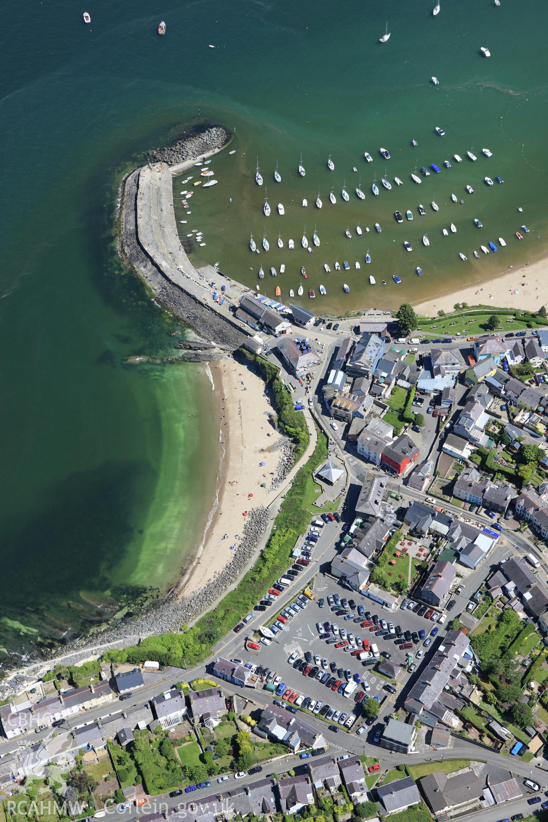 RCAHMW colour oblique aerial photograph of New Quay. Taken on 01 June 2009 by Toby Driver