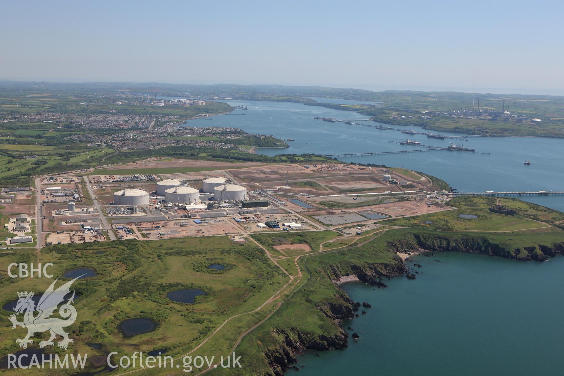 RCAHMW colour oblique aerial photograph of Esso South Hook Oil Refinery and liquid natural gas facility, Milford Haven. Taken on 01 June 2009 by Toby Driver