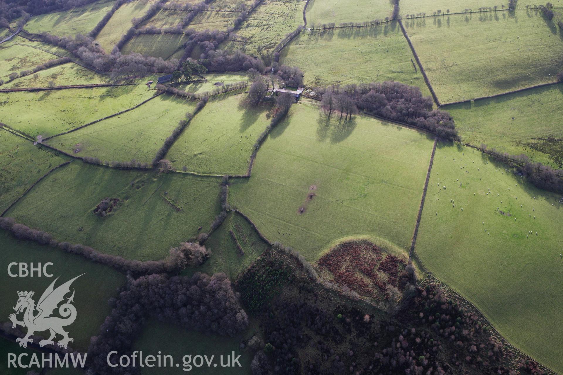 RCAHMW colour oblique aerial photograph of Ty'n-y-Cwm Defended Enclosure. Taken on 10 December 2009 by Toby Driver