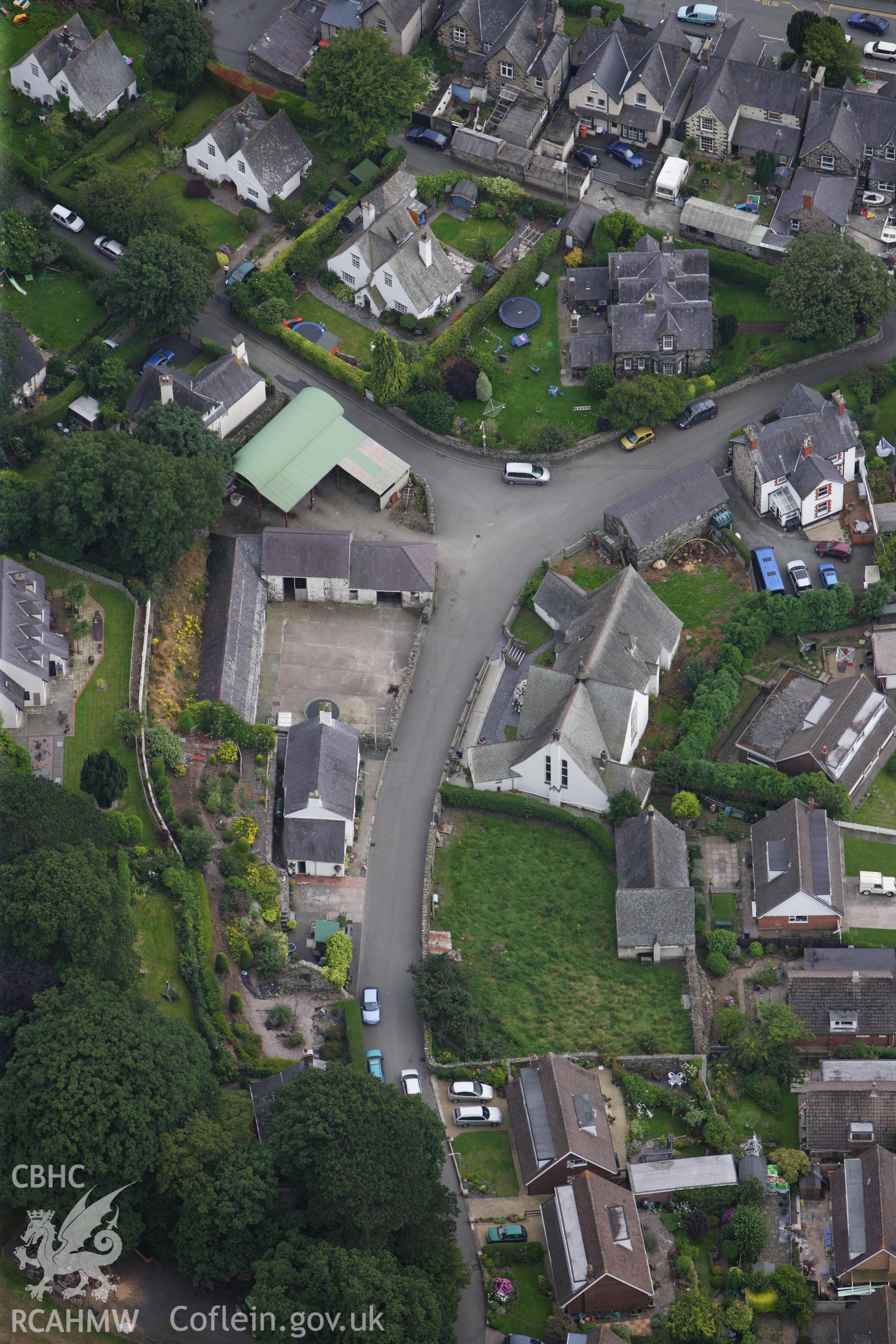 RCAHMW colour oblique aerial photograph of Church Institute, Park Road, Llanfairfechan. Taken on 06 August 2009 by Toby Driver