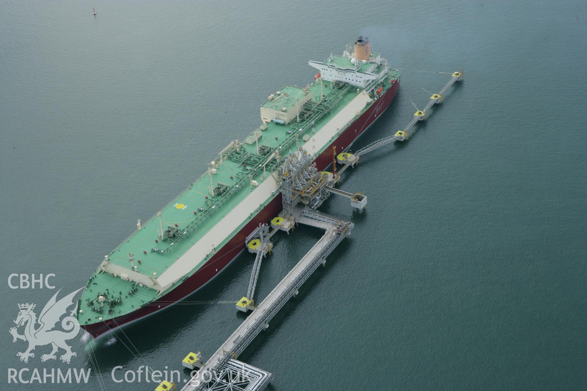RCAHMW colour oblique aerial photograph of the west jetty at South Hook Point, Milford Haven, showing a tanker delivering liquified natural gas. Taken on 14 October 2009 by Toby Driver
