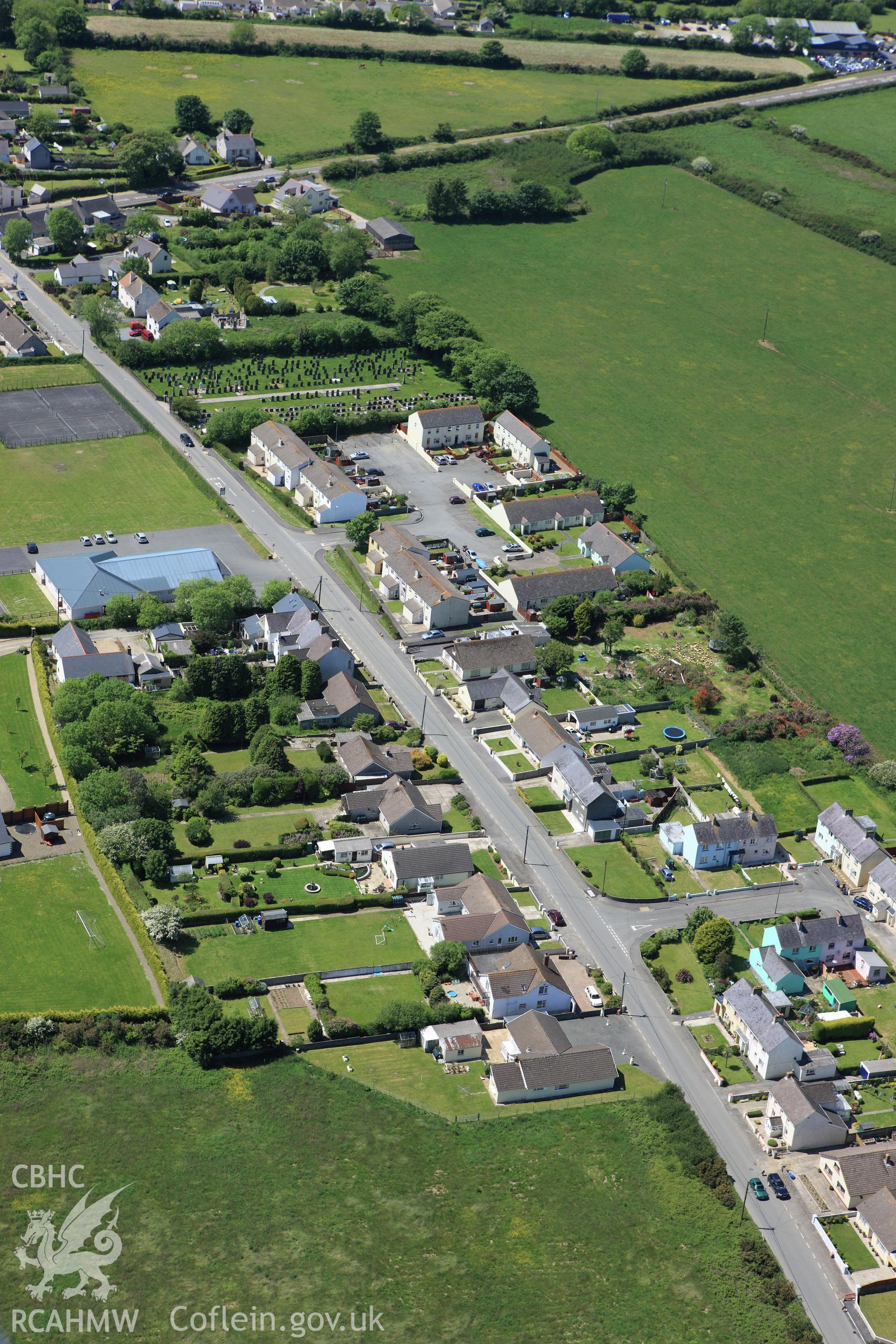 RCAHMW colour oblique aerial photograph of Pen-Dre Round Barrow. Taken on 01 June 2009 by Toby Driver