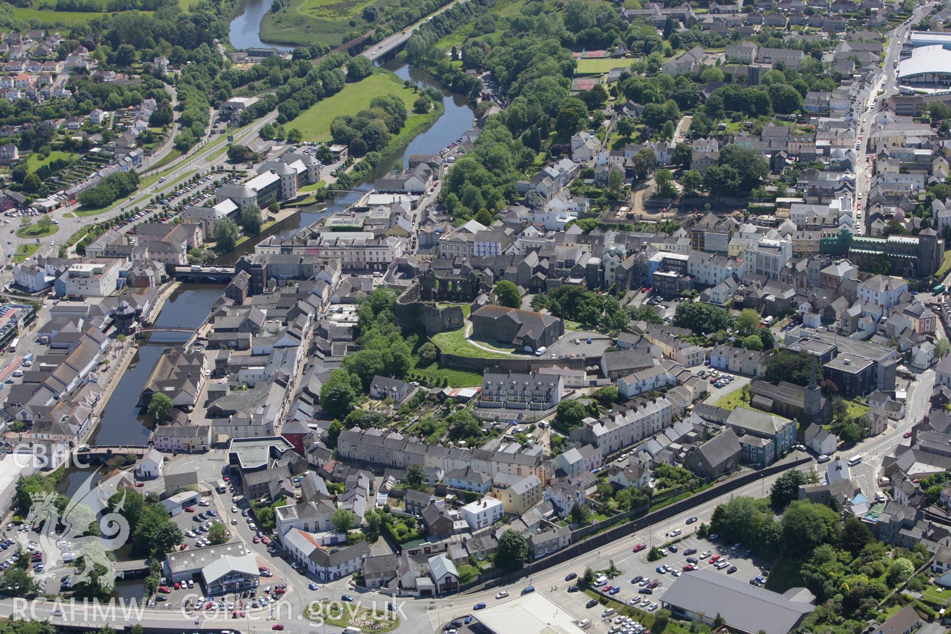 RCAHMW colour oblique aerial photograph of general view including Haverfordwest Castle. Taken on 01 June 2009 by Toby Driver