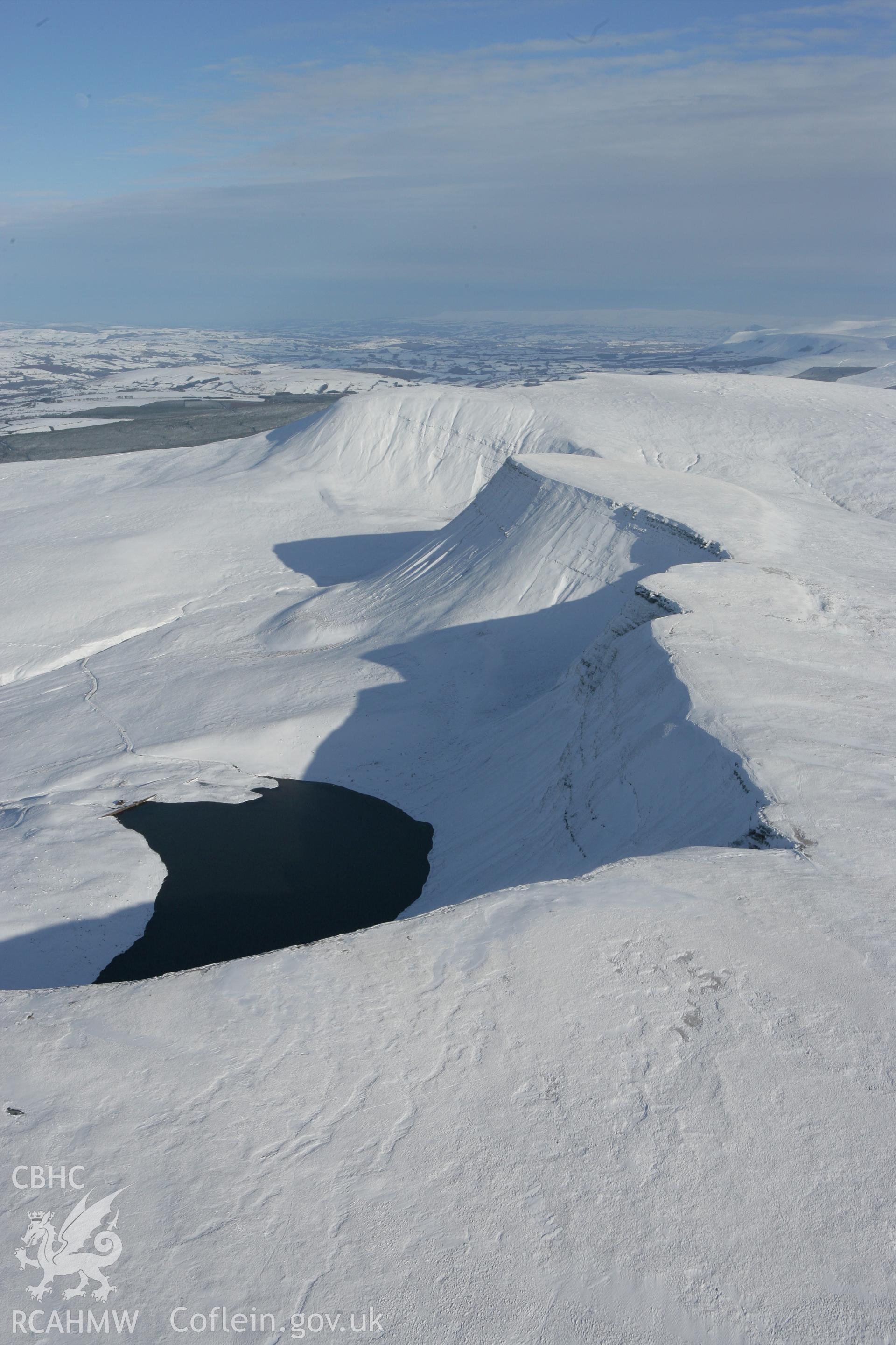 RCAHMW colour oblique photograph of Llyn y Fan Fach, winter landscape. Taken by Toby Driver on 06/02/2009.