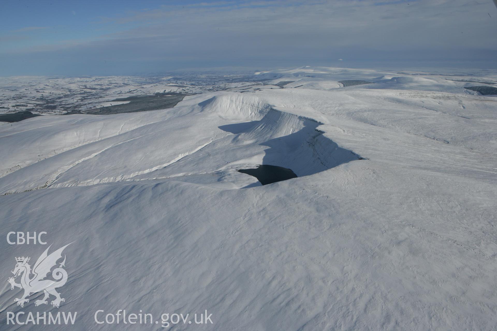 RCAHMW colour oblique photograph of Llyn y Fan Fach, winter landscape. Taken by Toby Driver on 06/02/2009.