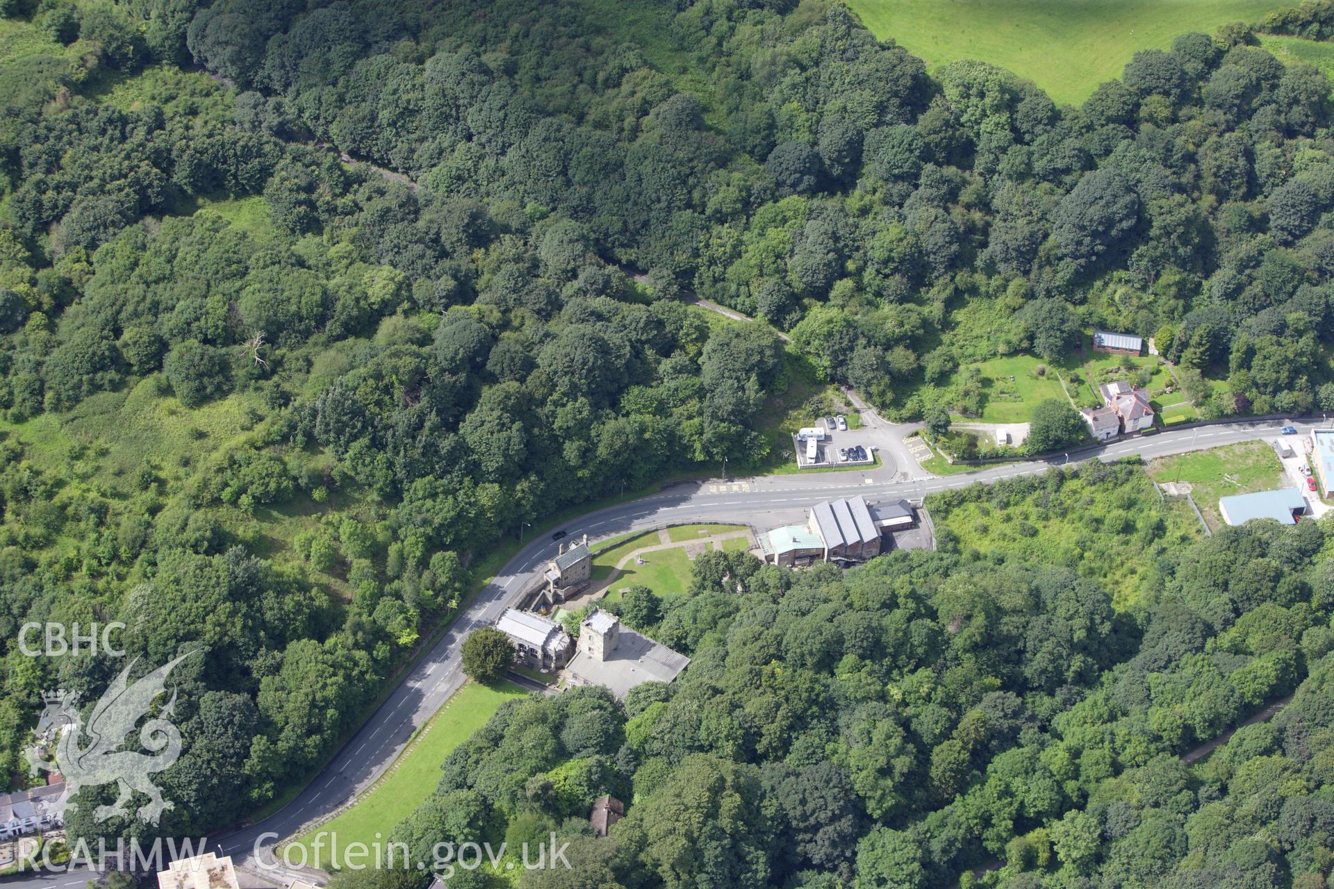 RCAHMW colour oblique aerial photograph of Holywell Castle Mound. Taken on 30 July 2009 by Toby Driver
