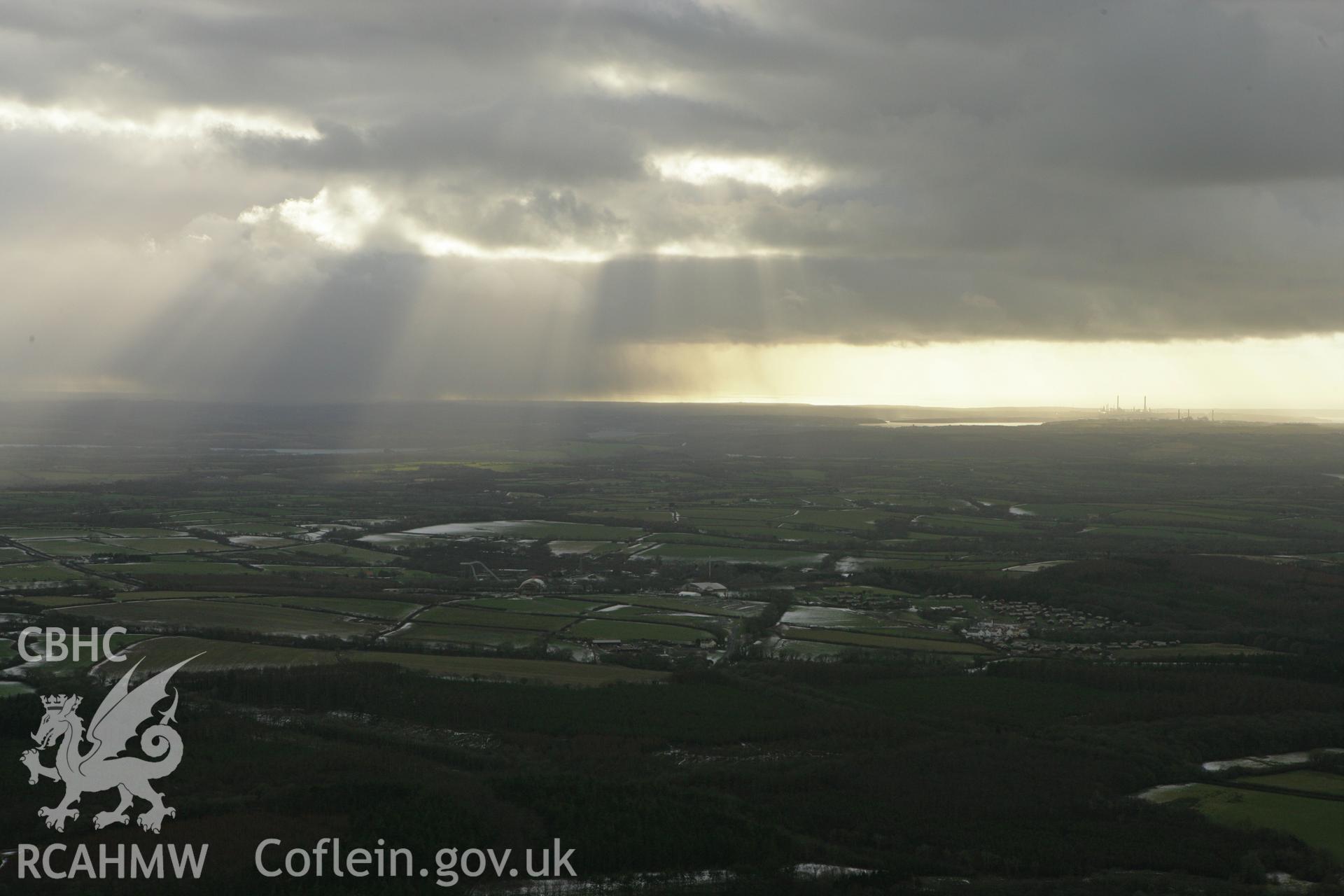 RCAHMW colour oblique photograph of Winter landscape over Oakwood theme park, looking west. Taken by Toby Driver on 06/02/2009.
