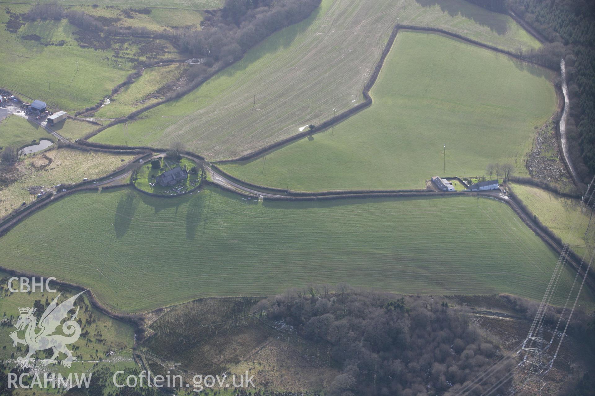 RCAHMW colour oblique photograph of St Cynog's Church. Taken by Toby Driver on 11/02/2009.