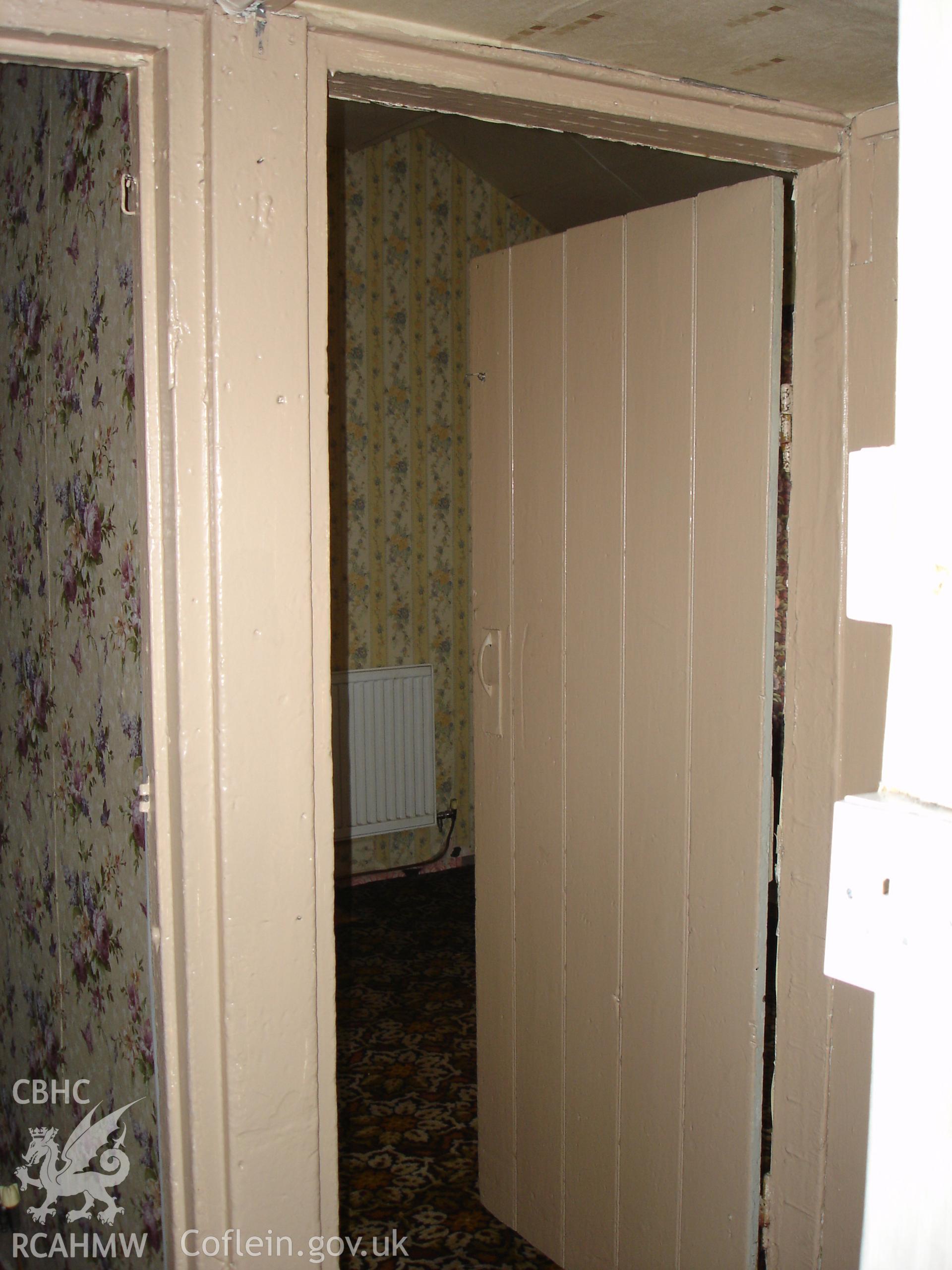 Colour digital photograph showing interior view (doorways) of a cottage at Gelli Houses, Cymmer.