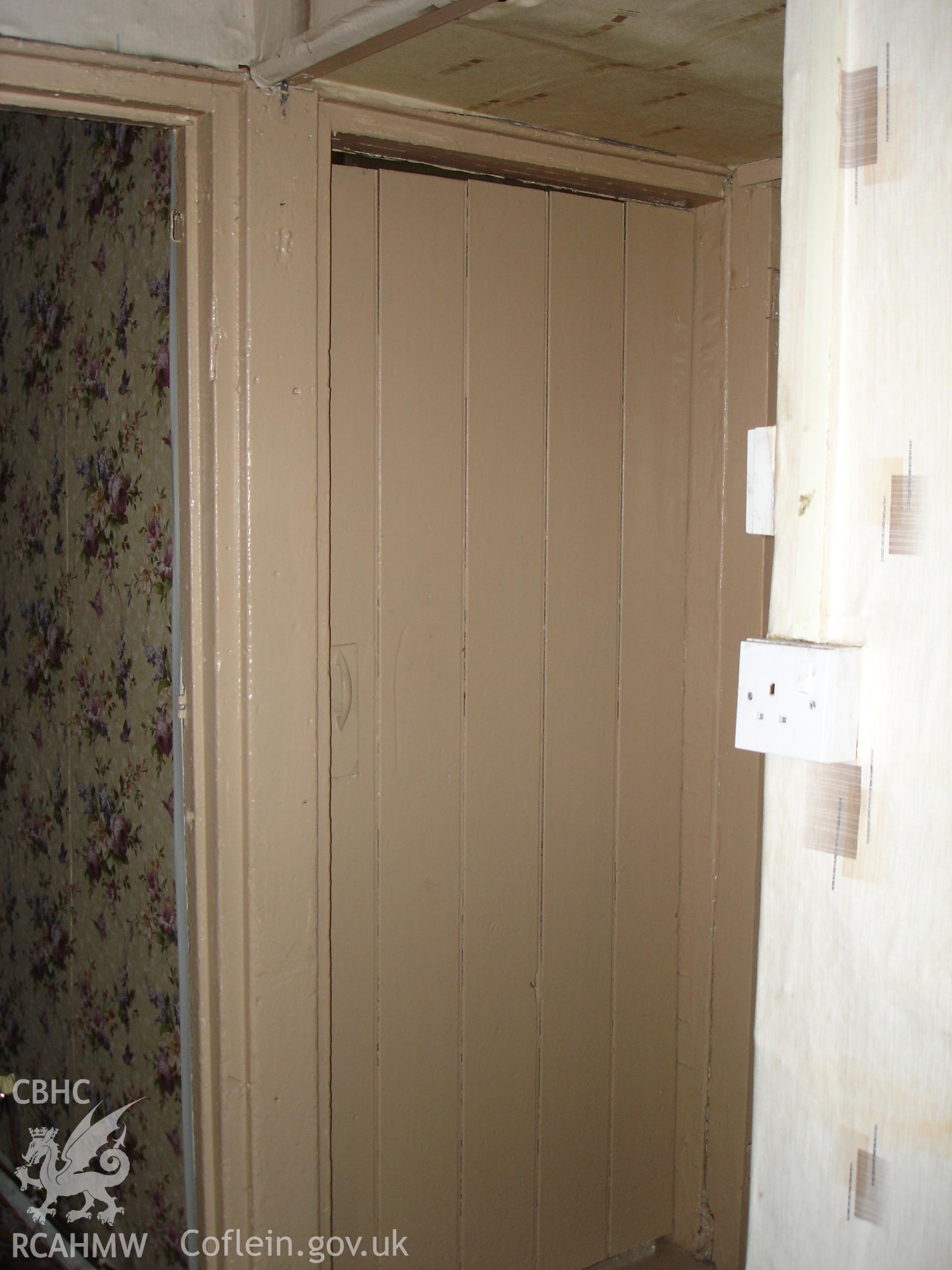 Colour digital photograph showing interior view (doorways) of a cottage at Gelli Houses, Cymmer.