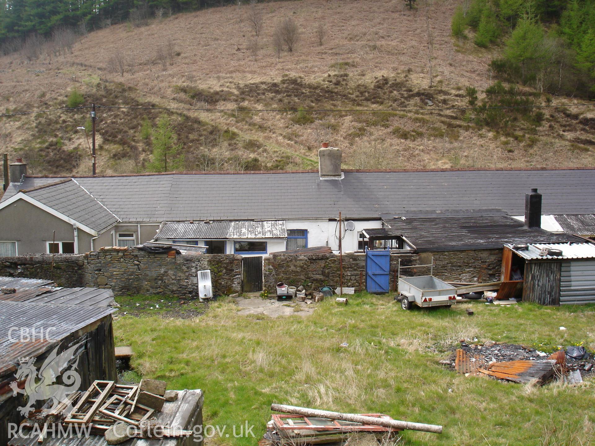 Colour digital photograph showing exterior rear view of cottages at Gelli Houses, Cymmer.