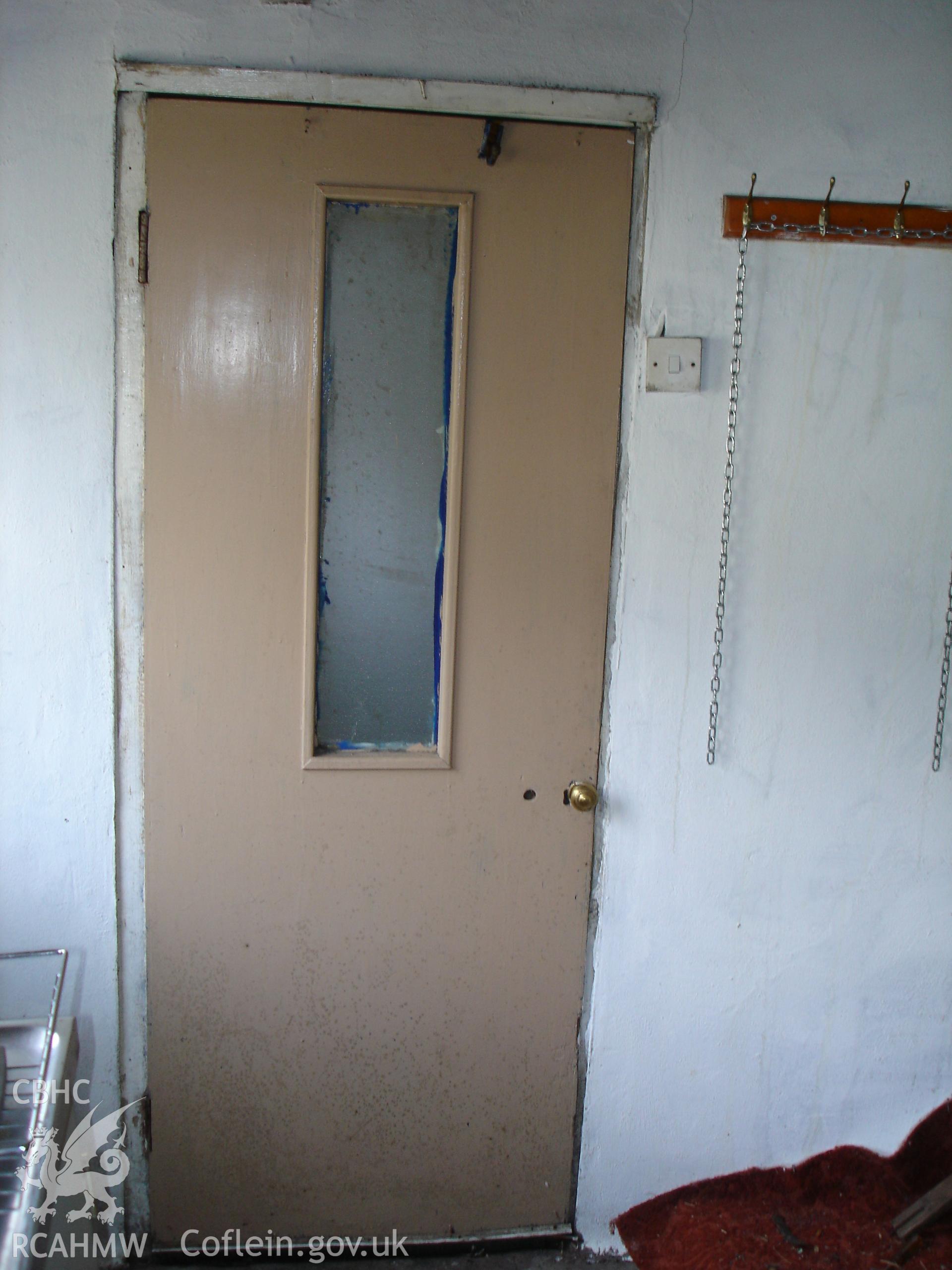 Colour digital photograph showing interior view (door) of a cottage at Gelli Houses, Cymmer.