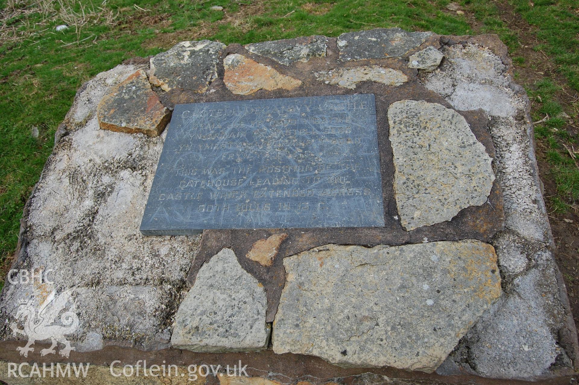 Digital photograph from an archaeological assessment of Deganwy Castle, carried out by Gwynedd Archaeological Trust, 2009. Slate plaque set up by a local group.