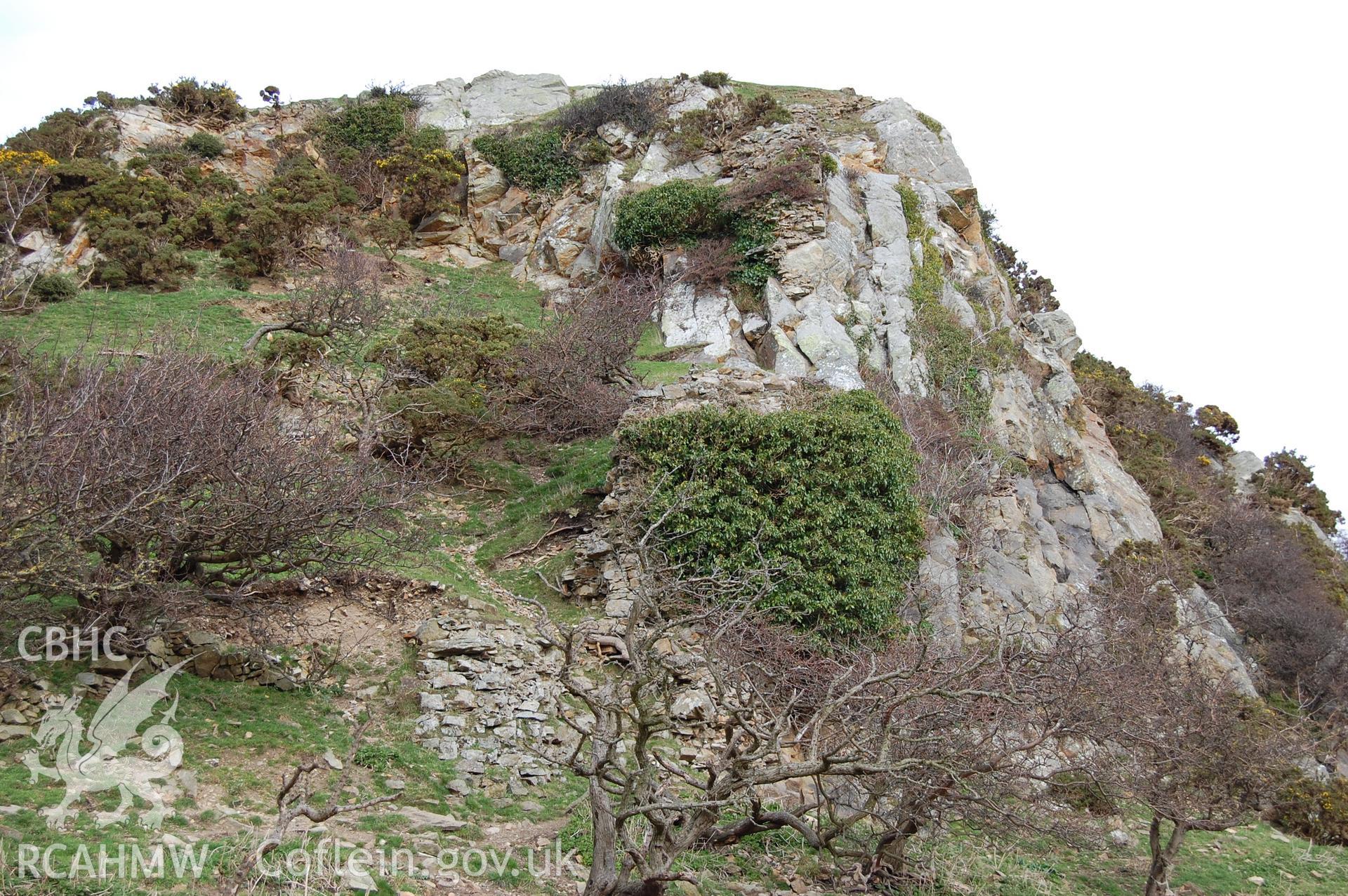 Digital photograph from an archaeological assessment of Deganwy Castle, carried out by Gwynedd Archaeological Trust, 2009. Remains of wall on East hill.