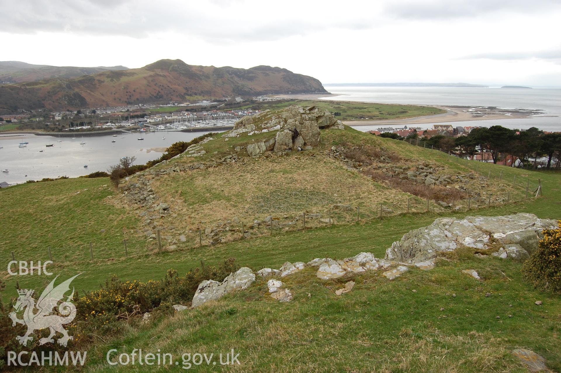 Digital photograph from an archaeological assessment of Deganwy Castle, carried out by Gwynedd Archaeological Trust, 2009. Fattw from crag to East.