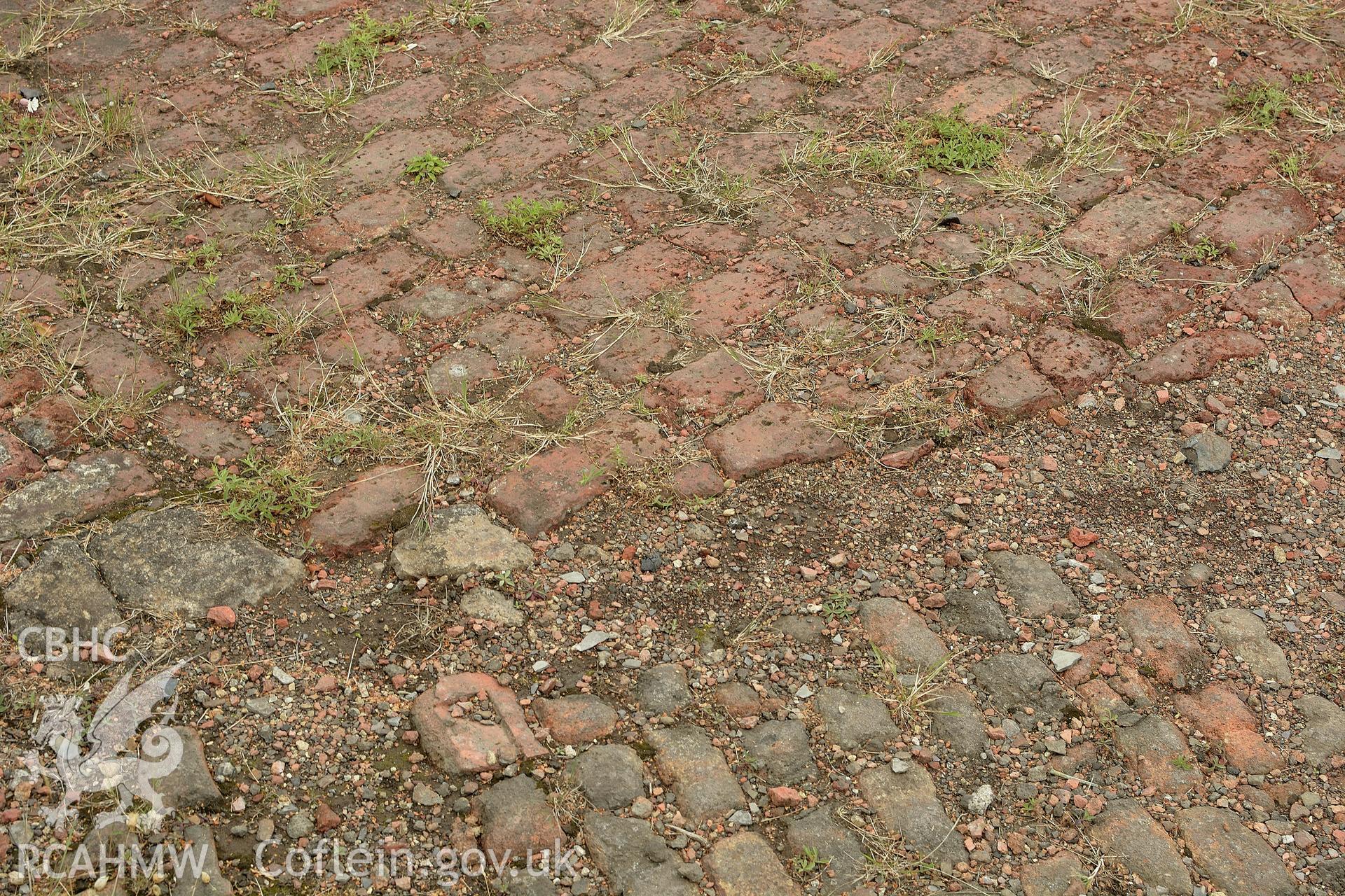 Floor section of building attached to incline opposite tramway