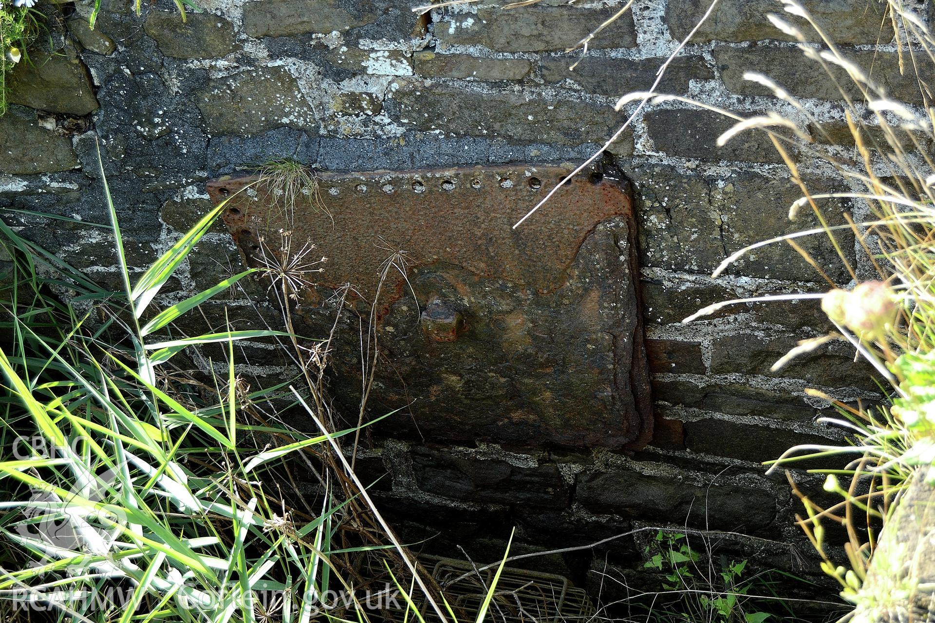 Plate attached to the end of the quay wall close to where building H would be situated