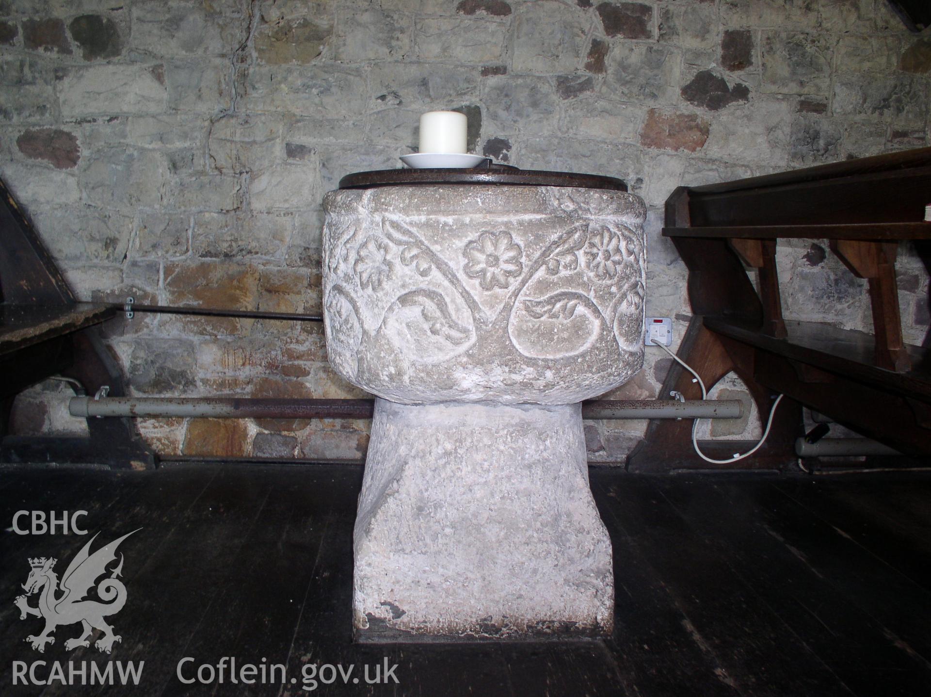 Colour digital photograph showing the font at St Elltteryn's Church, Capel Llanilltern.